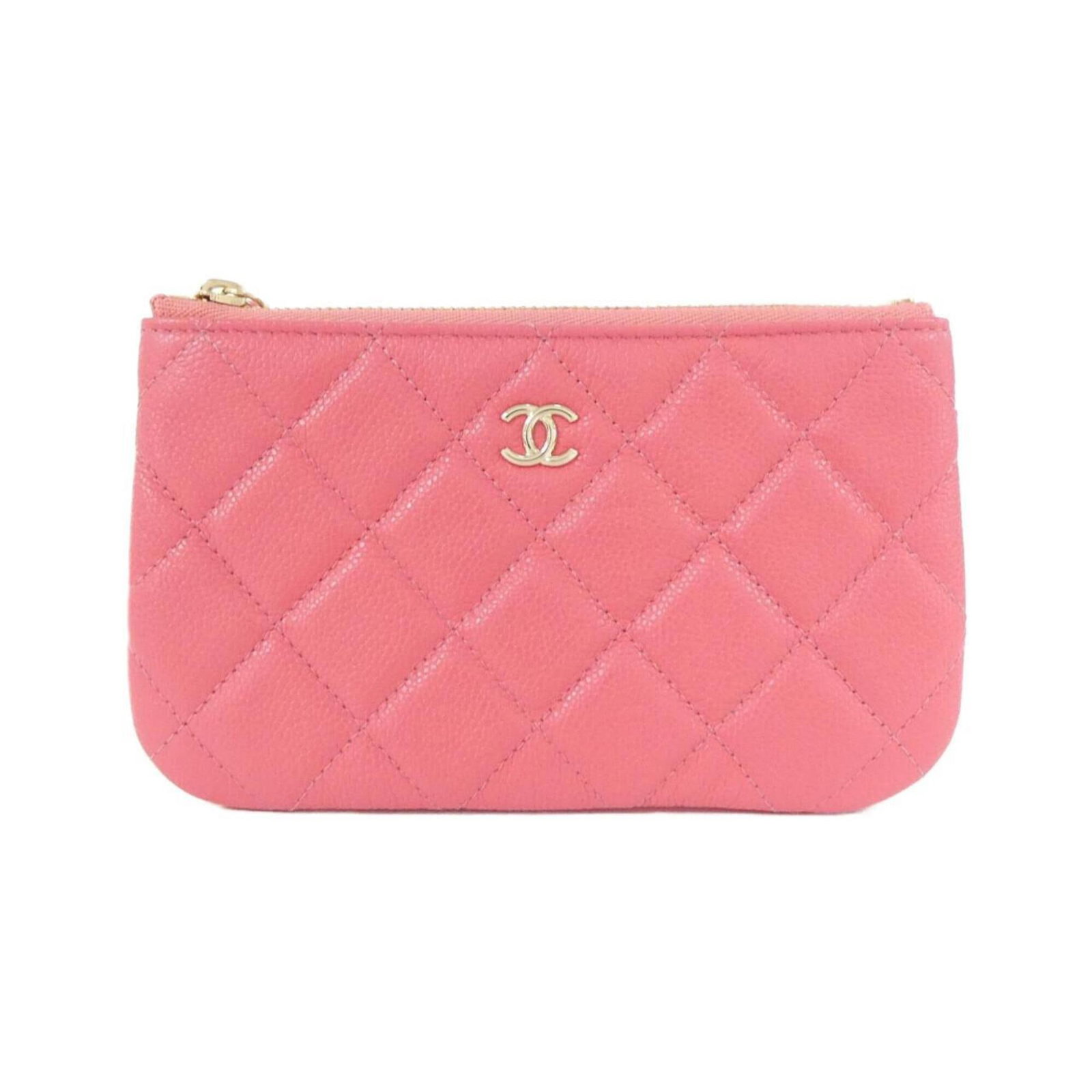 Calfskin Pouch Grained Chanel: Calfskin Pouch Grained Chanel Calfskin Pouch Grained Chanel is made from high-quality Grained Calfskin, a classic material for Chanel's iconic designs. This pink-colored pouch features a sleek 9cm x