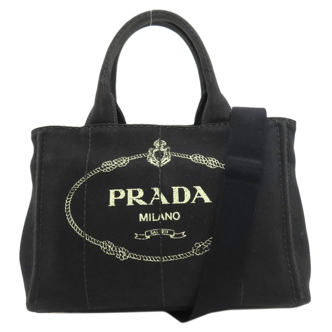 Canvas Tote Bag 2Way Prada: Canvas Tote Bag 2Way Prada Canvas tote bag with a 2-way closure, measuring 7.5 inches in height and 5.9 inches in depth, features a black exterior made of canvas material, and has a detachable strap. 