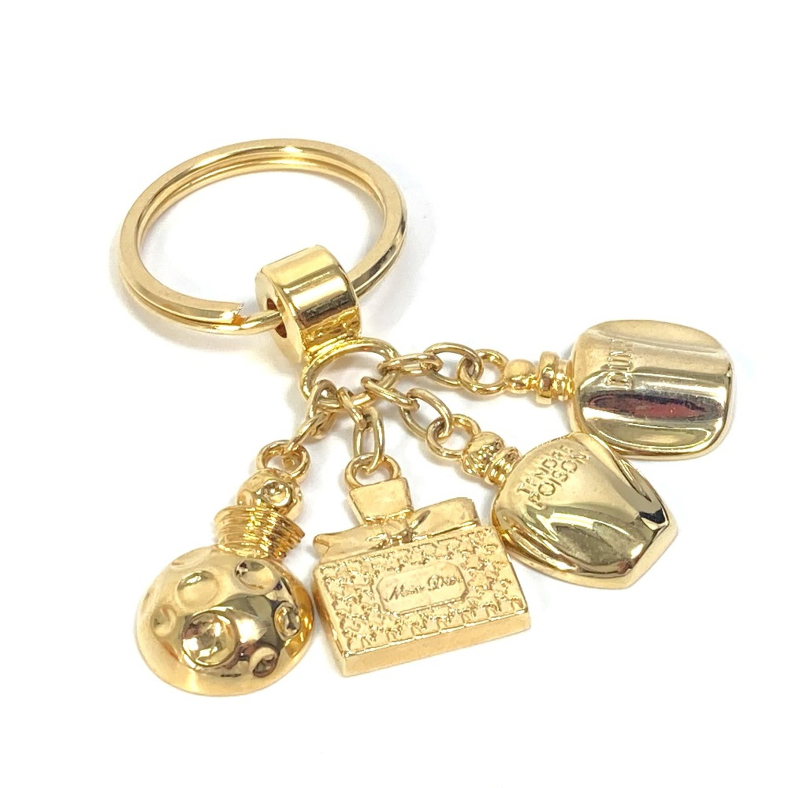 Christian Dior Gold Plated Keyring: Christian Dior Gold Plated Keyring Christian Dior's gold plated keyring is a sleek and sophisticated accessory, boasting a luxurious gold finish. Measuring 3.0inch / 7.5cm in total length, this