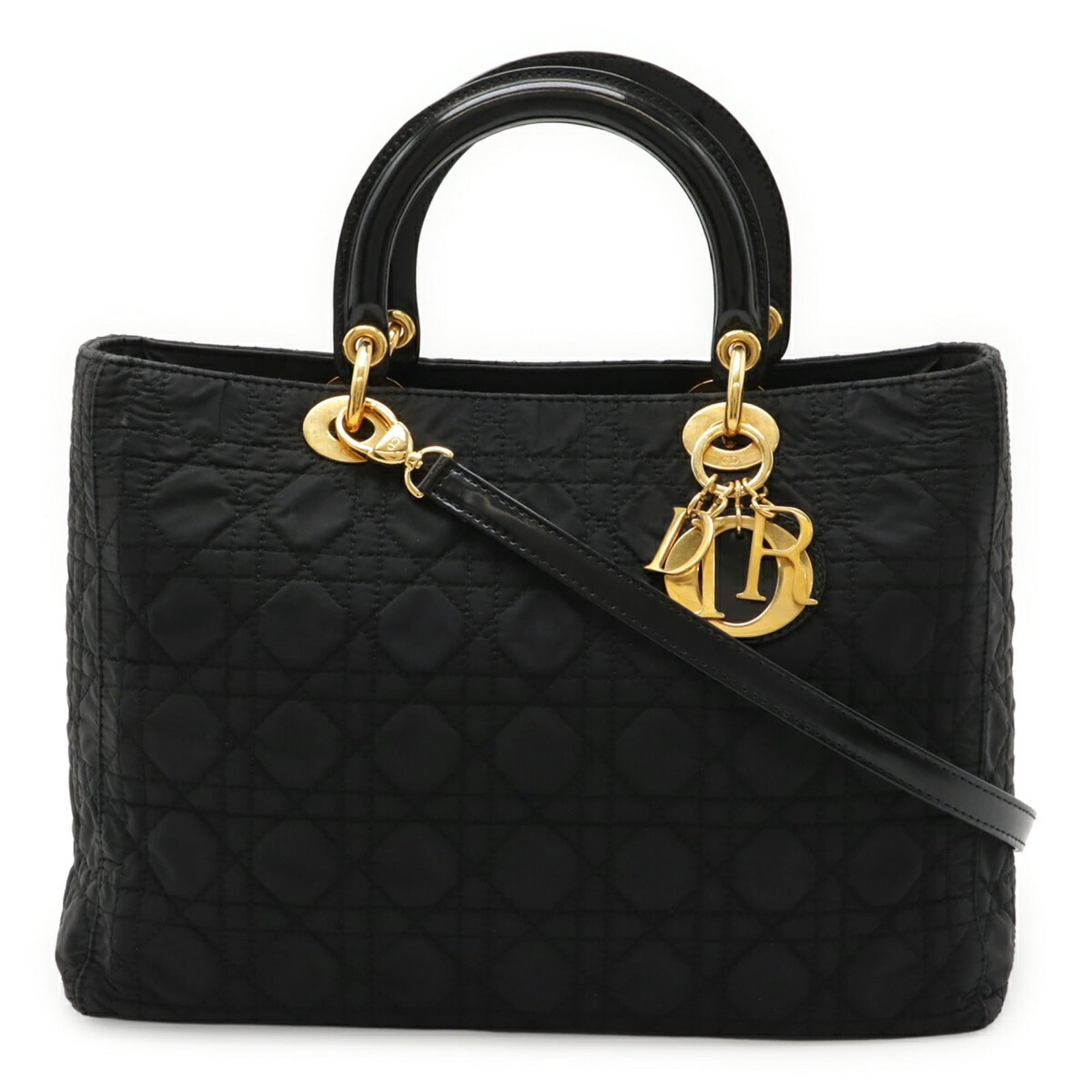 Nylon Christian Dior Tote Bag Handbag: Nylon Christian Dior Tote Bag Handbag Nylon Christian Dior Tote Bag features a sleek black design, perfect for casual everyday use. Made from durable nylon, this tote bag measures 24.5cm x 31.5cm x 11