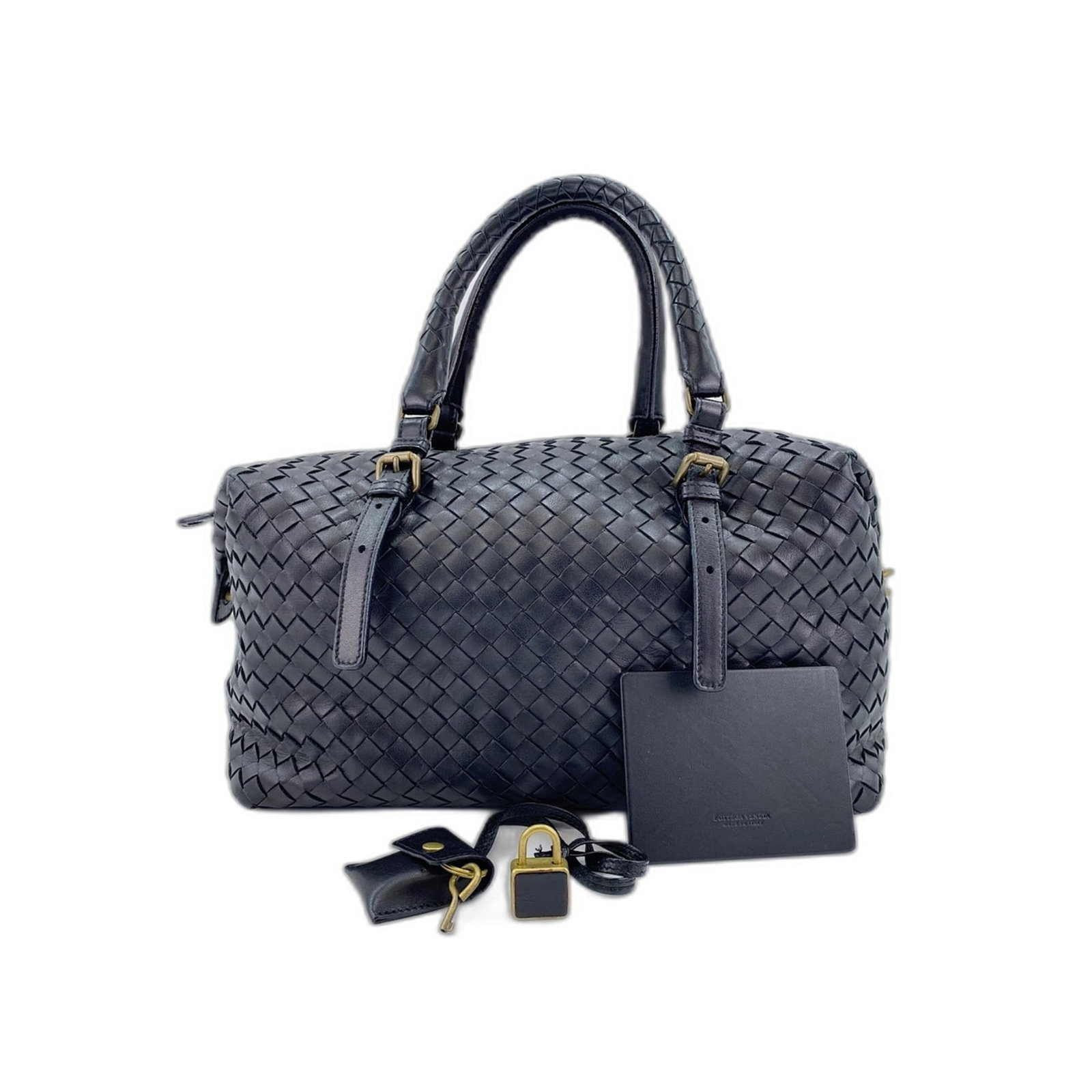 Boston Handbag Bag Bottega Veneta: Boston Handbag Bag Bottega Veneta Boston Handbag Bag Bottega Veneta is a black, 18cm x 30cm x 17cm bag made by Bottega Veneta. This bag bears a signature and features the brand's signature style and