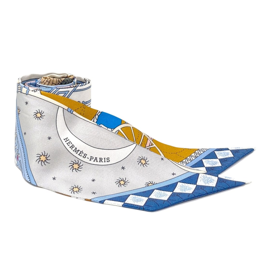Hermes Silk Twilly Scarf: Hermes Silk Twilly Scarf Blue silk twilly scarf from the renowned brand HERMES, featuring a striking blue exterior. Made from high-quality silk, this scarf showcases the timeless elegance of the