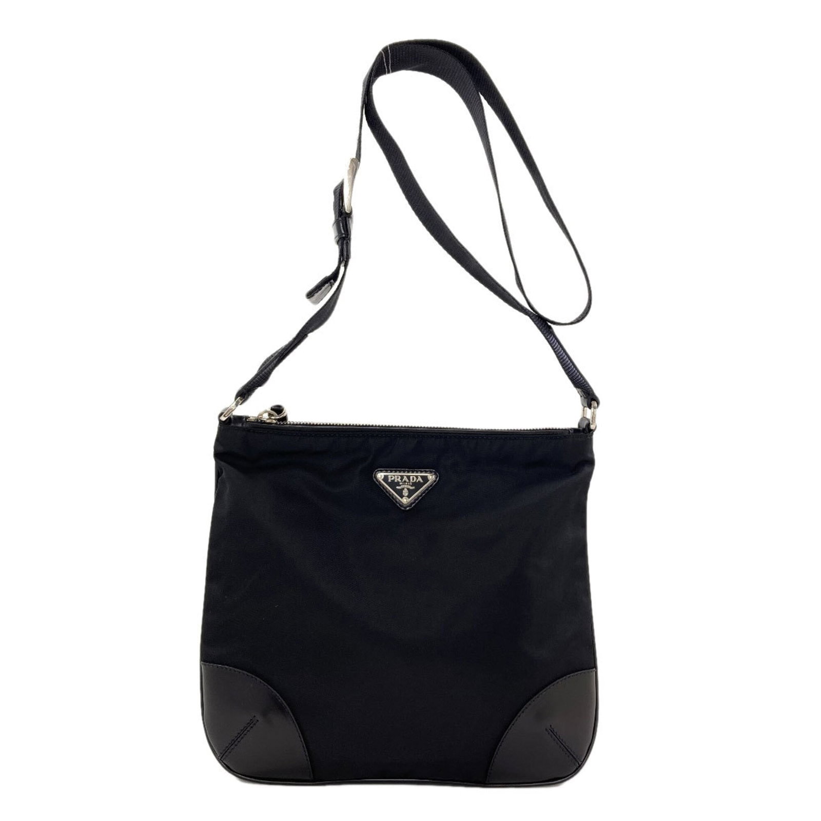 Shoulder Bag Nylon: Shoulder Bag Nylon Black Prada Shoulder Bag made from Nylon, featuring a zipper closure and adjustable strap length of 100cm-106cm. The bag measures 23cm x 24cm x 2cm and is available in a sleek