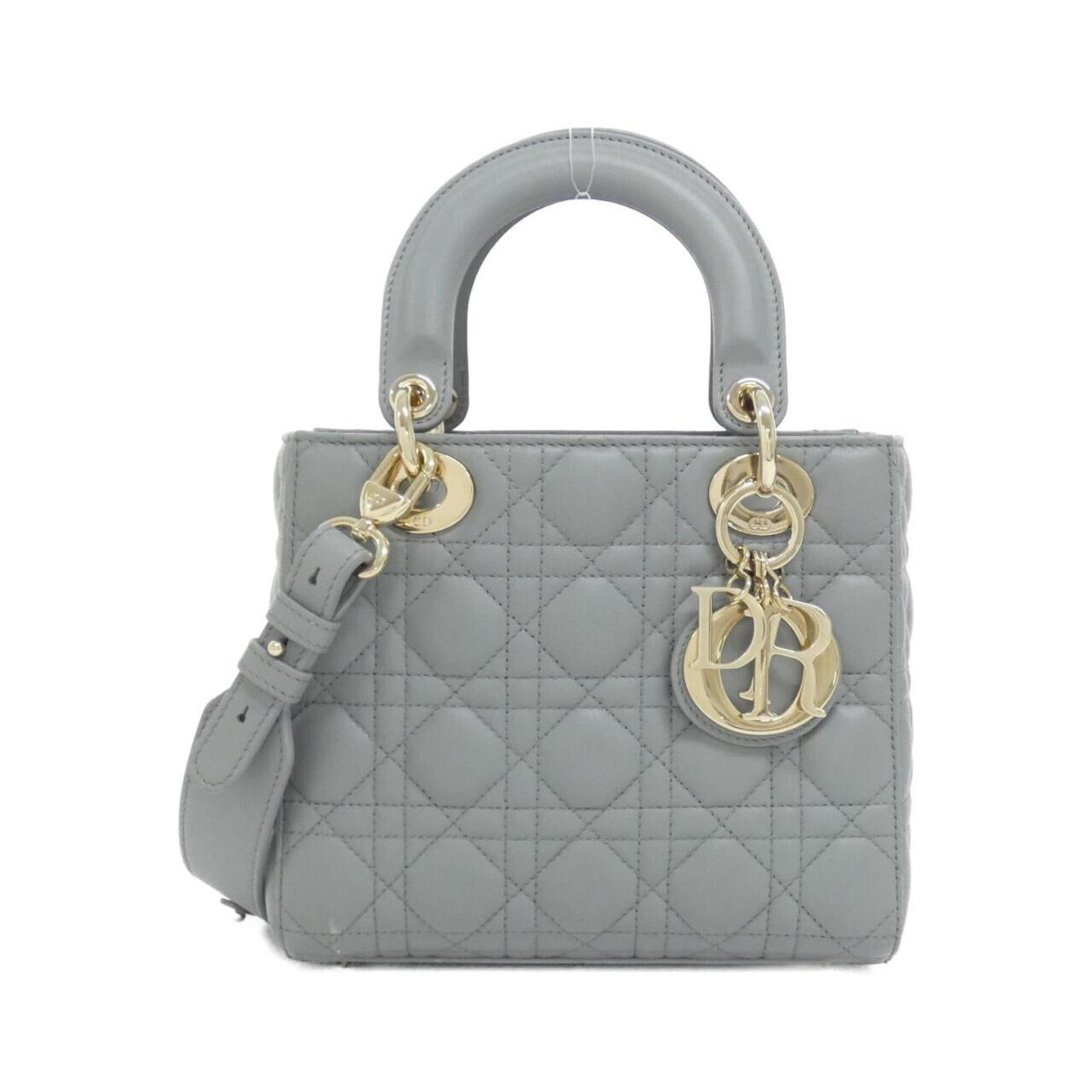 Handbag Leather Dior Christian: Handbag Leather Dior Christian This luxurious handbag features a stunning gray lambskin exterior, crafted from high-quality leather. Measuring 17cm x 20cm x 8cm, it boasts a sleek and sophisticated
