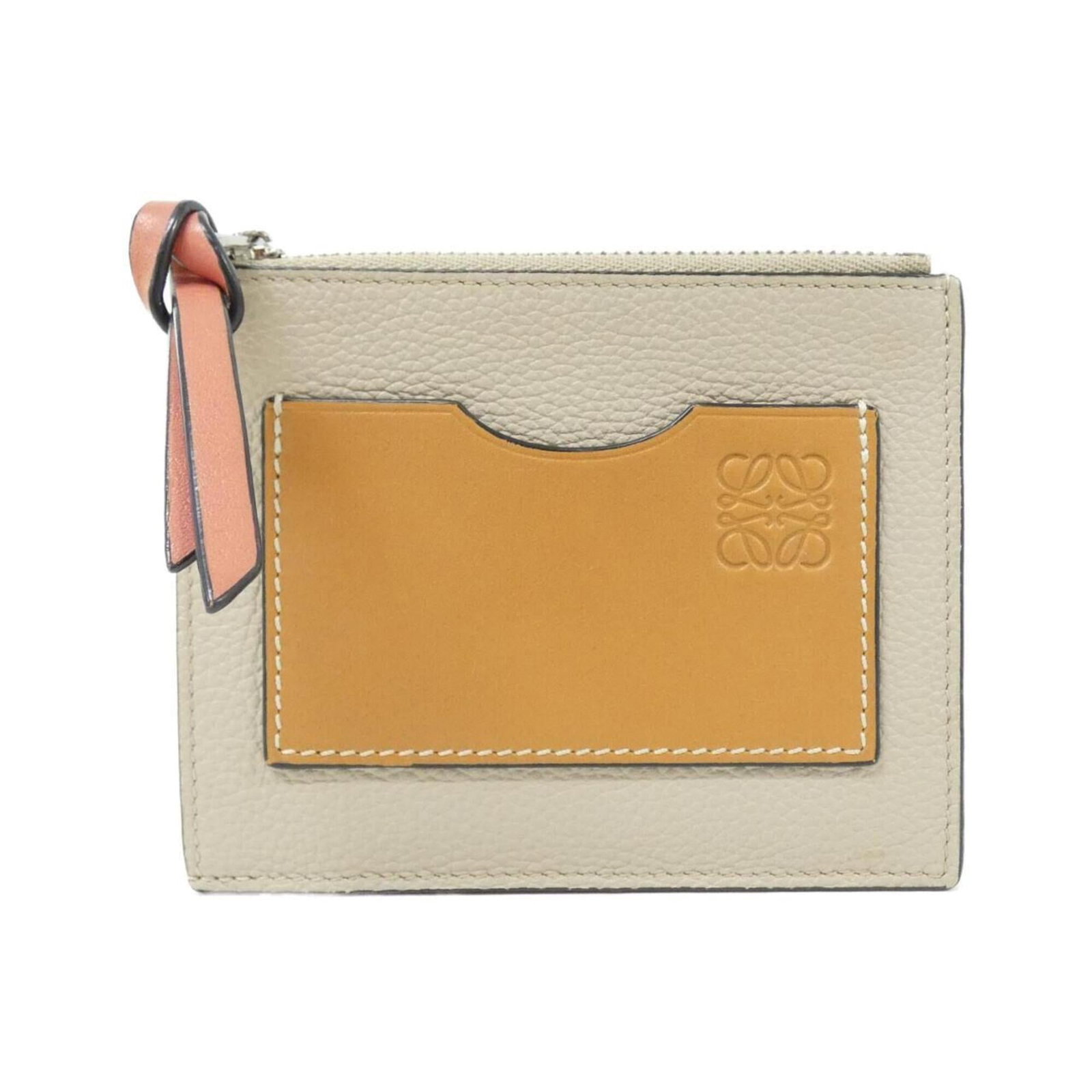 Loewe Coin Purse/ Coin Case Leather: Loewe Coin Purse/ Coin Case Leather Calfskin leather coin purse in beige, measuring 10cm x 12cm x 1.5cm, crafted with a classic design. This stylish accessory features a simple yet elegant design,