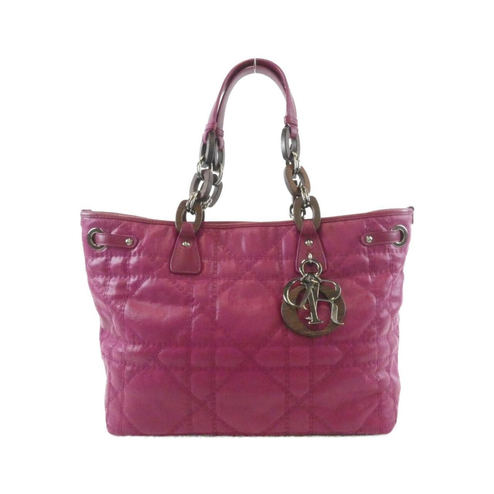 Canvas Coated Handbag Christian Dior: Canvas Coated Handbag Christian Dior Canvas Coated Handbag by Christian Dior. This purple handbag features a coated canvas material and measures 24cm x 30cm x 15cm. The bag bears a signature, and its
