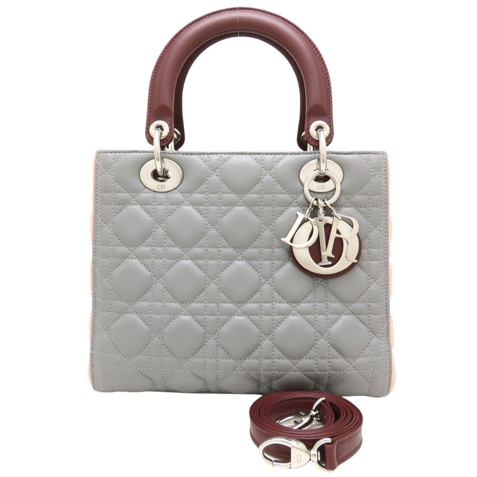 Handbag Leather Dior Christian: Handbag Leather Dior Christian Leather Dior Christian handbag from France, featuring a classic design with a Bordeaux, Gray, or Pink color option, and silver hardware. The bag measures 20cm x 24cm x