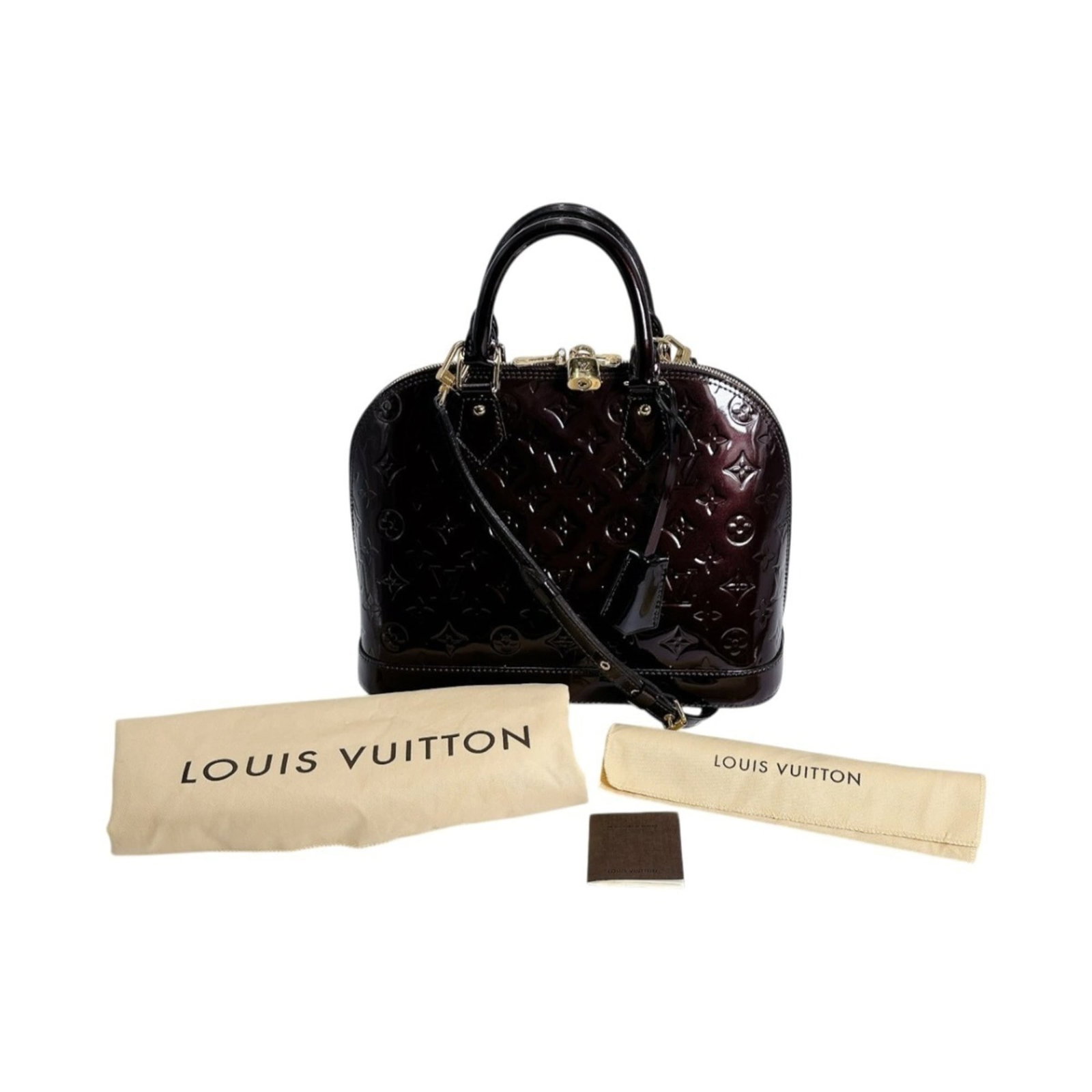 Vuitton Handbag Monogram Vernis Louis: Vuitton Handbag Monogram Vernis Louis Monogram Vernis Louis Vuitton Handbag in Red Color. This iconic handbag features the iconic Louis Vuitton monogram pattern in a rich red wine color, crafted from