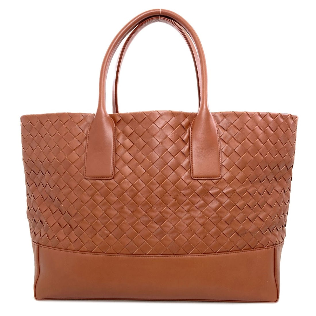 Calf Veneta Tote Intrecciato Cabas Bag: Calf Veneta Tote Intrecciato Cabas Bag Calf Veneta Tote Intrecciato Cabas Bag is crafted from high-quality Calf leather, giving it a rich, luxurious feel. The iconic Intrecciato woven pattern adds a
