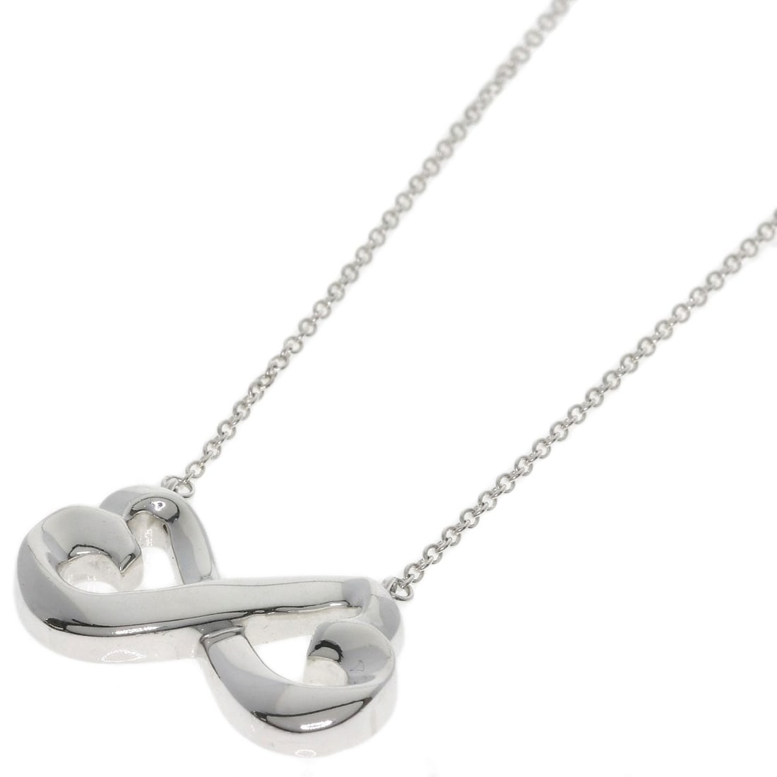Heart Rubbing Double Silver Necklace Tiffany&Co: Heart Rubbing Double Silver Necklace Tiffany&Co Silver necklace from Tiffany&Co. features a double silver design, with no main stone. Measuring 16.9 inches in length, this necklace showcases a