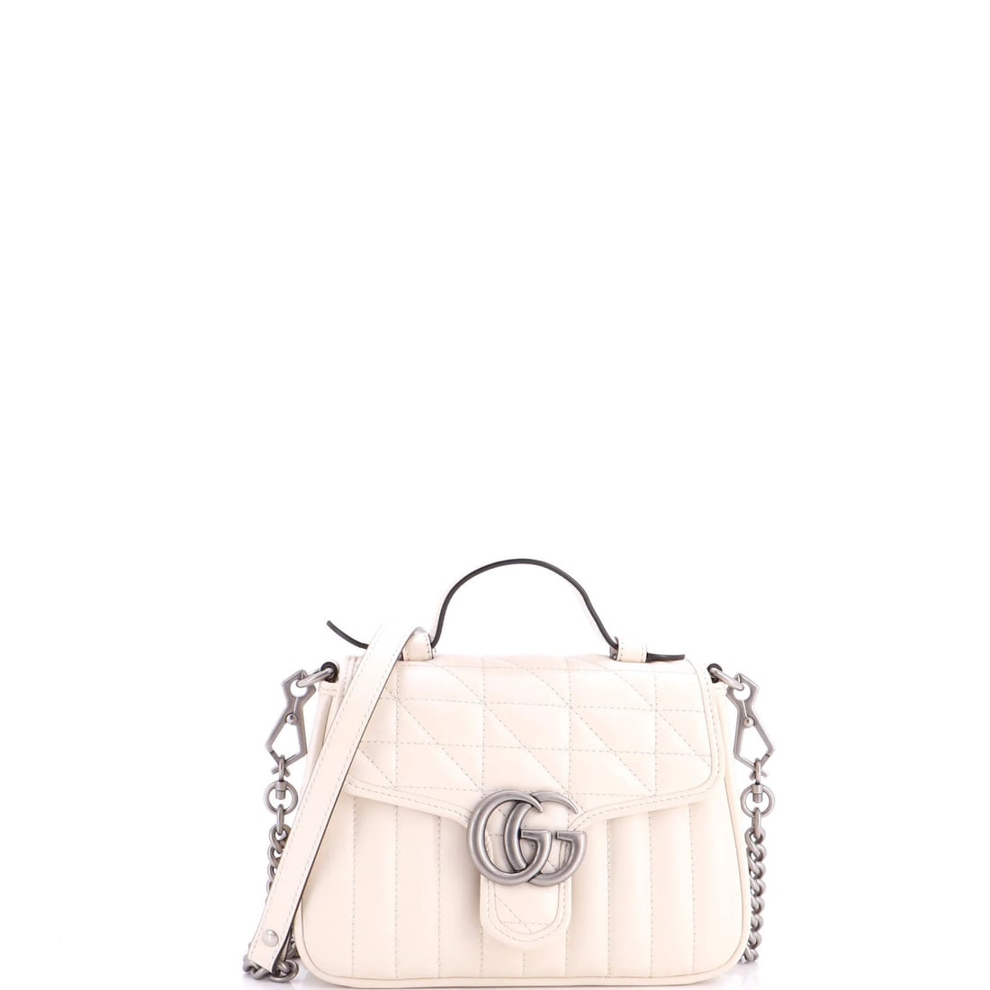 Marmont GG Gucci Top Handle Bag Flap Mini Matelasse Leather: Marmont GG Gucci Top Handle Bag Flap Mini Matelasse Leather Mini GG Marmont Top Handle Flap Bag in Neutral Matelasse Leather. This compact, neutral-toned bag features Gucci's signature Marmont GG logo