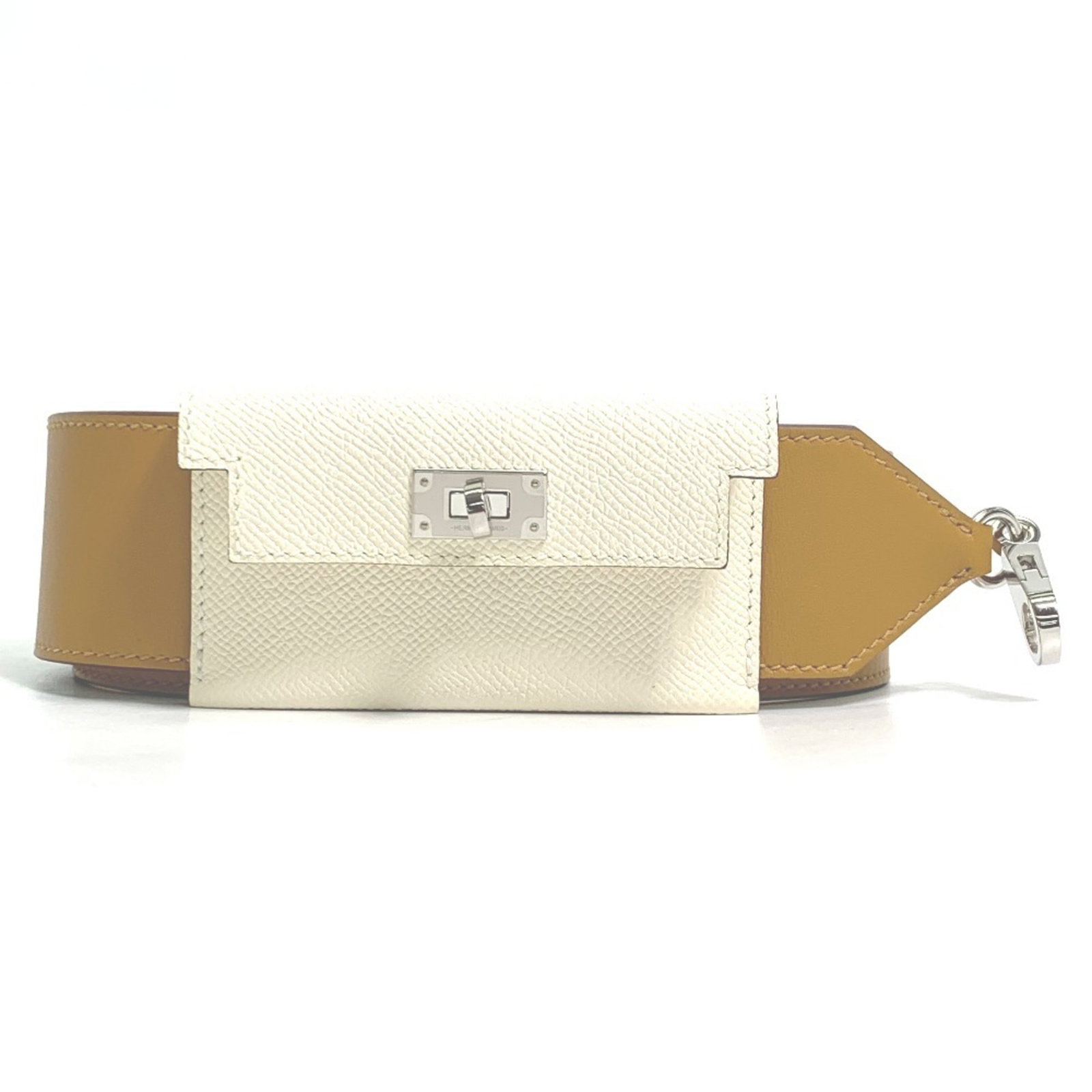 Swift Leather Epsom Leather Hermes Strap: Swift Leather Epsom Leather Hermes Strap Swift Leather Epsom Leather Hermes Strap is a high-quality accessory made from Epsom leather and Swift leather, with a beige color and a sleek design.