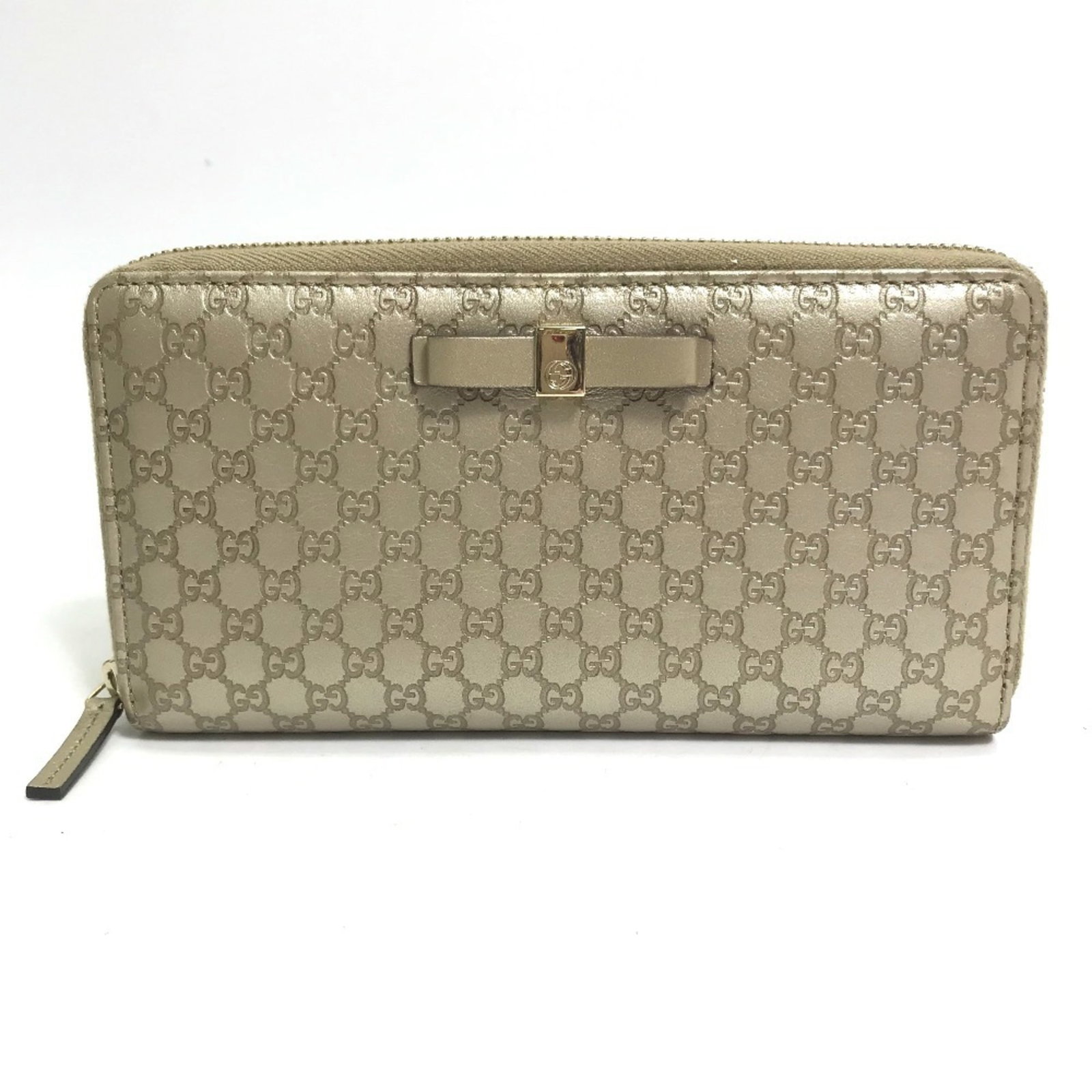 Gucci Long Wallet (Bi-Fold) Leather: Gucci Long Wallet (Bi-Fold) Leather Gucci's iconic bi-fold long wallet is crafted from high-quality leather, offering a sleek and sophisticated design. Measuring 9.5cm x 18cm, this wallet features a