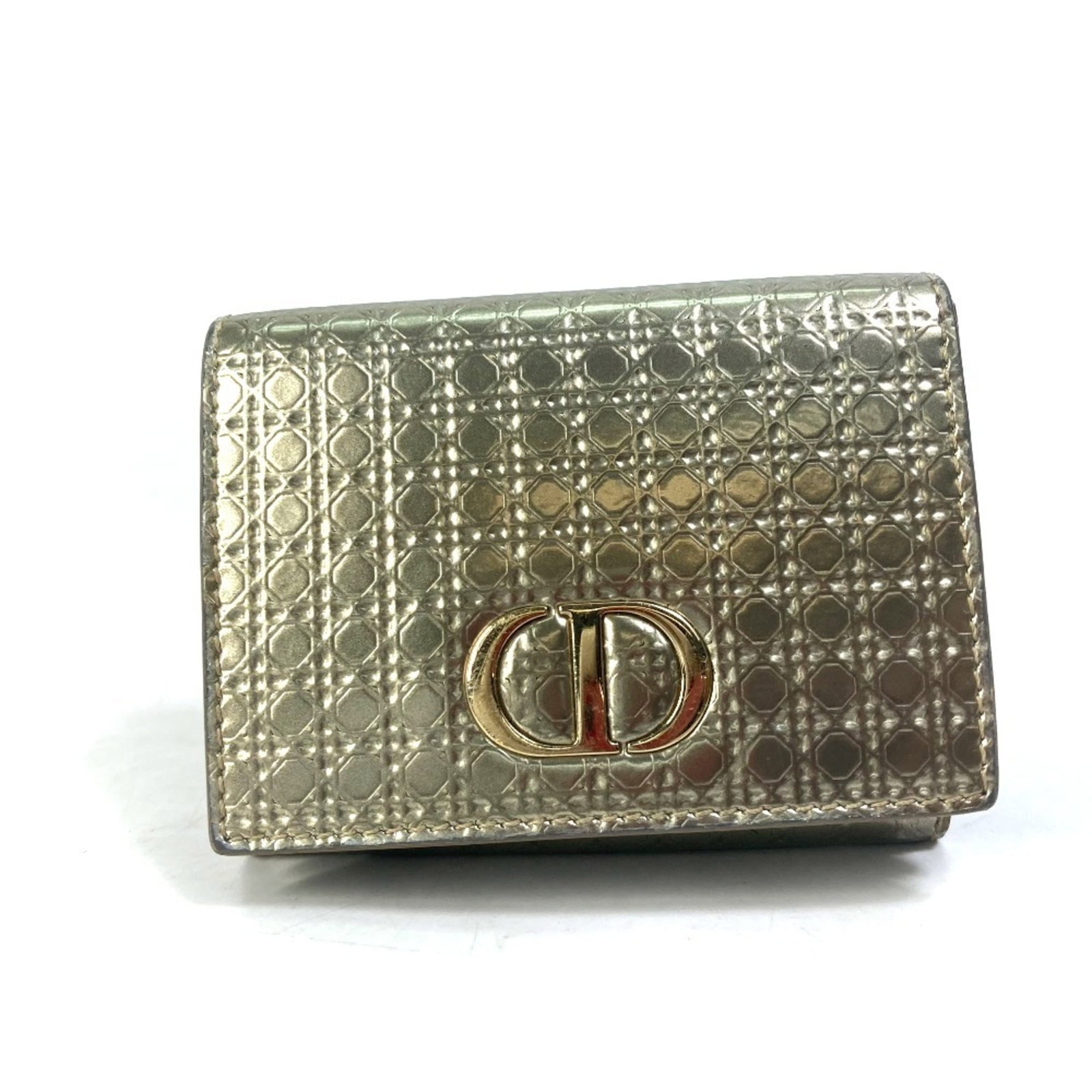Christian Dior Wallet (Tri-Fold) Leather: Christian Dior Wallet (Tri-Fold) Leather Compact and elegant, this Christian Dior CD logo tri-fold wallet is crafted from high-quality leather and features a gold snap fastener for a touch of sophisti