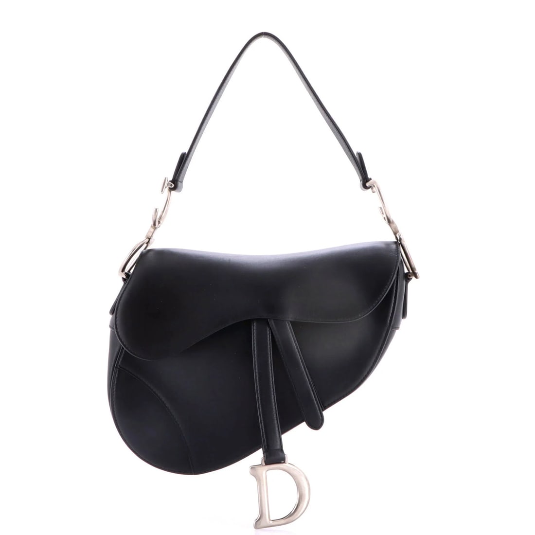 Saddle Handbag Medium Leather Christian Dior: Saddle Handbag Medium Leather Christian Dior Saddle Handbag Medium Leather Christian Dior - A timeless shoulder bag with sleek black leather exterior, adorned with aged silver hardware. Measuring 8.5"