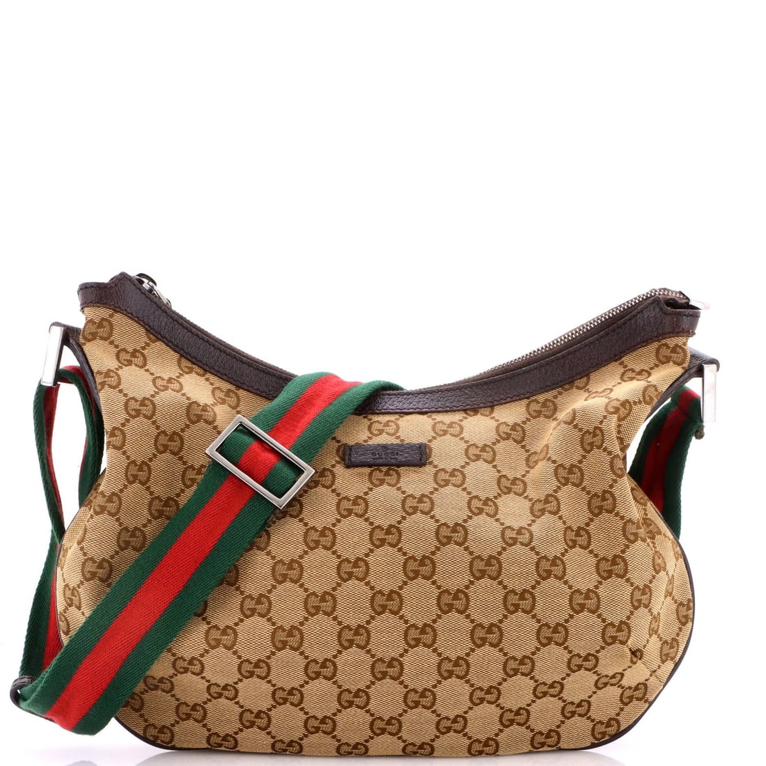 Zip Saddle Messenger Bag Canvas GG Leather Medium: Zip Saddle Messenger Bag Canvas GG Leather Medium This Gucci Saddle Zip Messenger Bag features a sturdy canvas exterior with a rich brown color, complemented by a touch of silver hardware. The bag's m