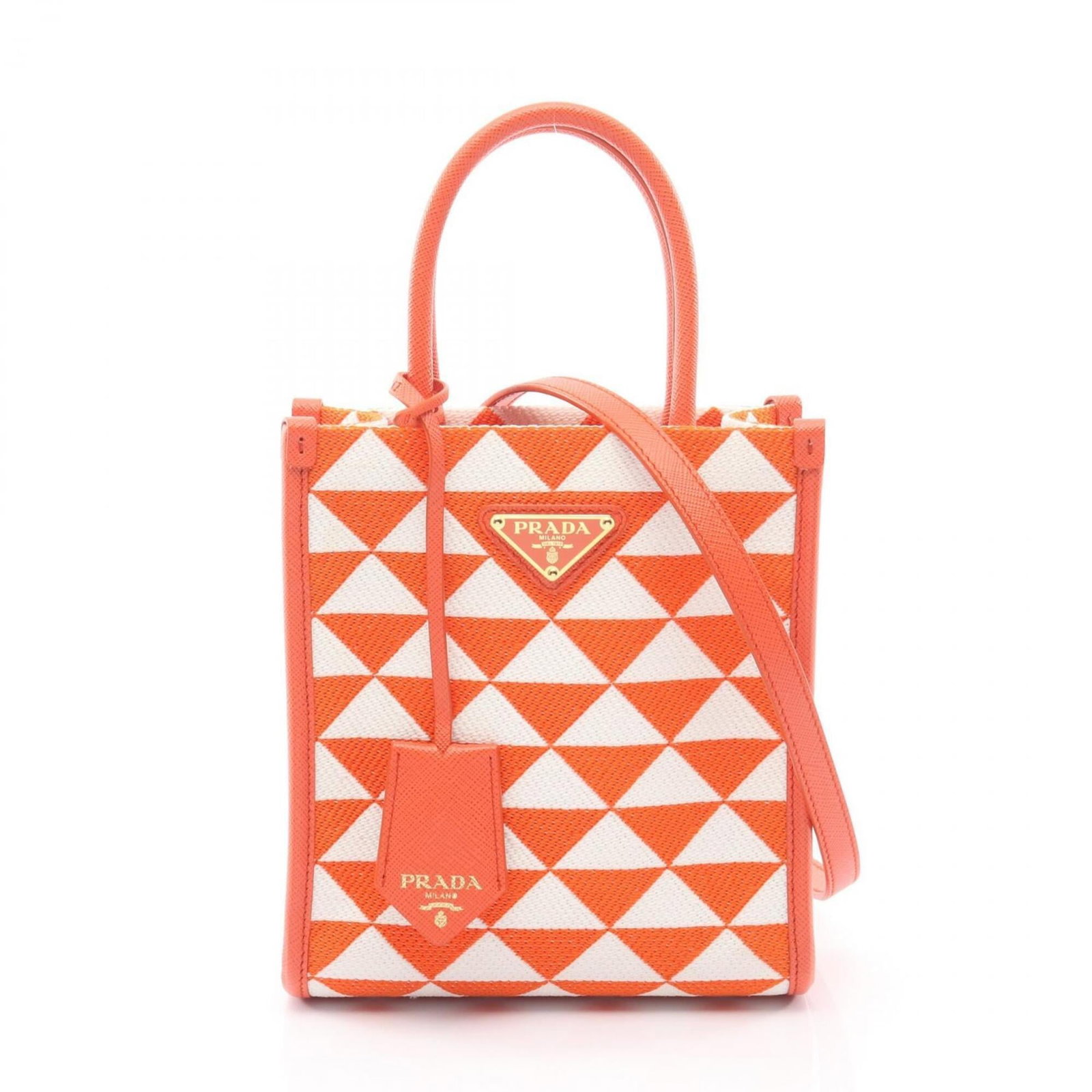 Canvas Leather Handbag Prada: Canvas Leather Handbag Prada Canvas Leather Handbag Prada bears a signature. Made from Saffiano leather, this handbag features a unique orange and white color combination. Its compact size, measuring 