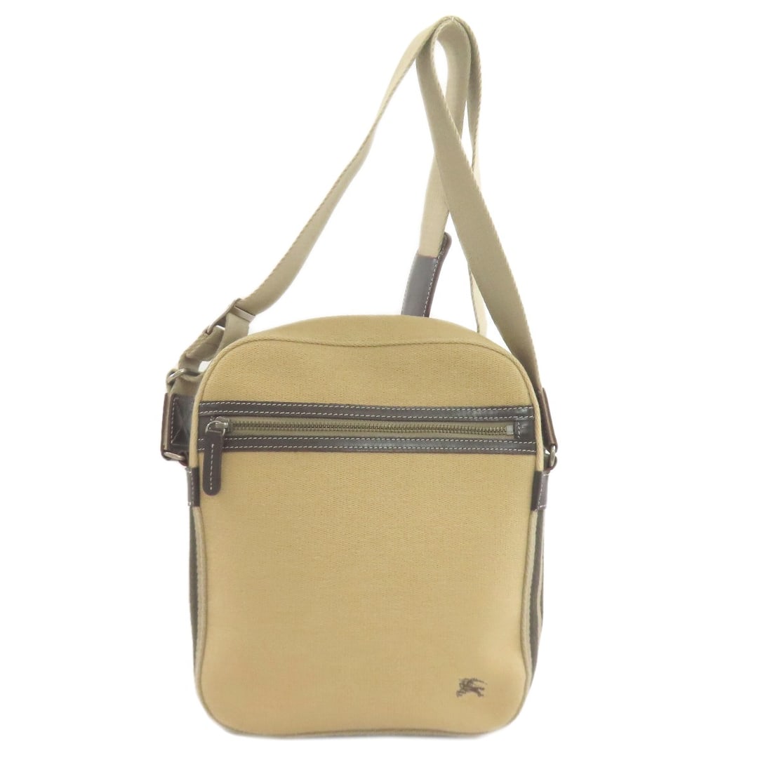 Blue Label Shoulder Bag Canvas: Blue Label Shoulder Bag Canvas Beige canvas shoulder bag with a classic BURBERRY style, featuring a timeless design that exudes understated sophistication. This shoulder bag boasts a high-quality