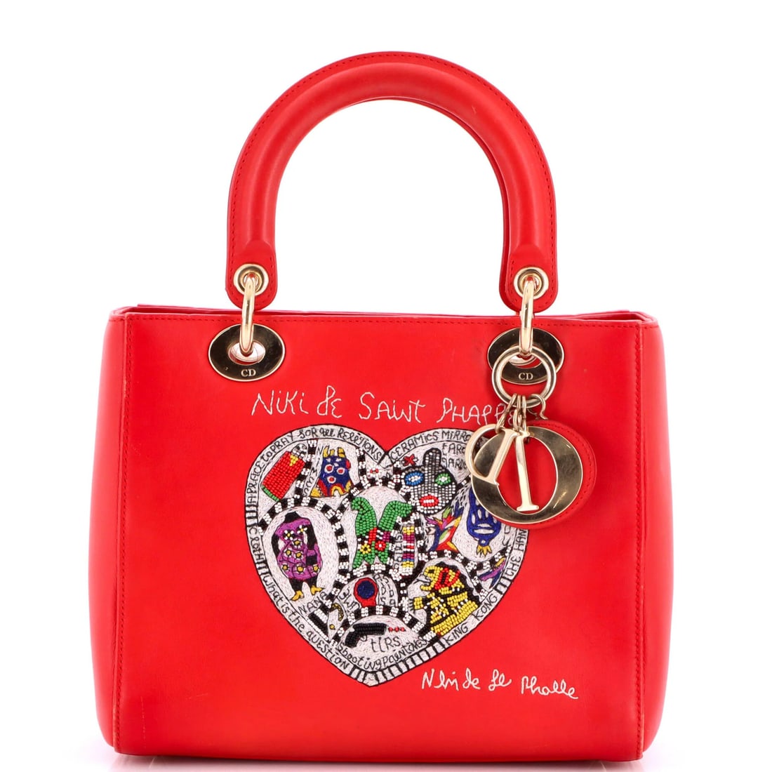 Dior Lady Bag Niki de Saint Phalle Christian Dior Embroidered Limited Edition: Dior Lady Bag Niki de Saint Phalle Christian Dior Embroidered Limited Edition The Dior Lady Bag Niki de Saint Phalle is a stunning, limited edition handbag featuring an embroidered design. Made from