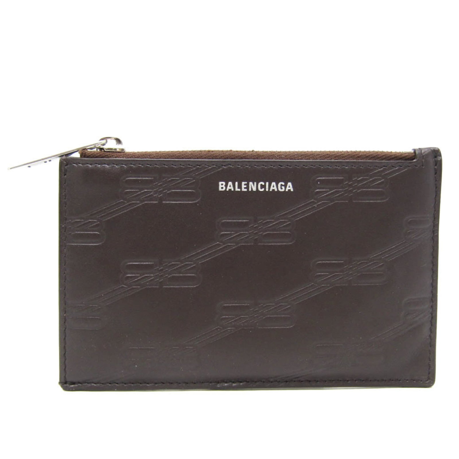 Card case Leather Balenciaga: Card case Leather Balenciaga Dark brown leather card case from Balenciaga's Fragment Case collection, measuring 8cm x 13cm x 5mm. Made from high-quality Italian leather, this compact case features a