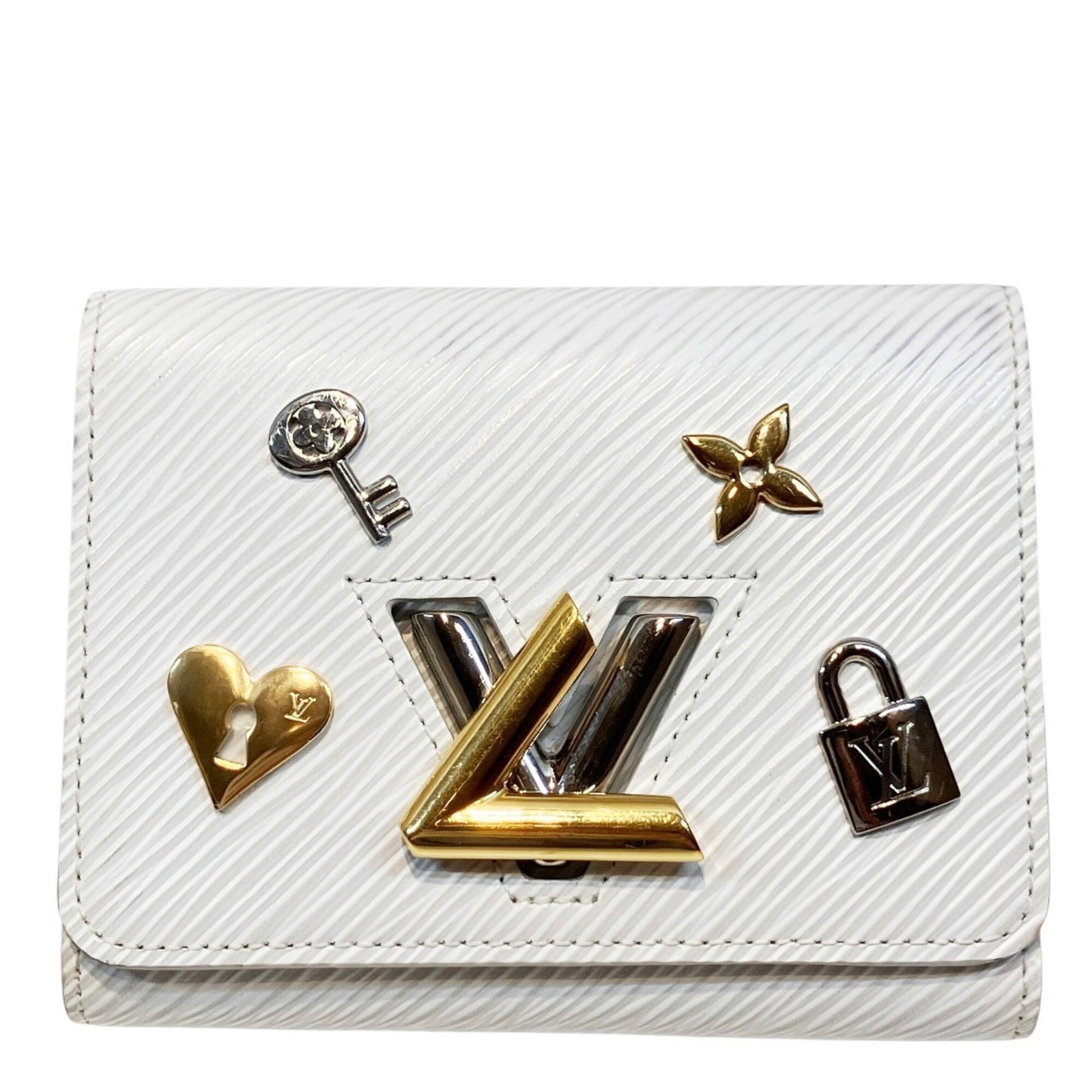 Louis Vuitton Wallet (Tri-Fold) Leather: Louis Vuitton Wallet (Tri-Fold) Leather Tri-fold leather wallet from Louis Vuitton, featuring a classic design with clean lines and a timeless white leather finish. The compact size makes it easy to