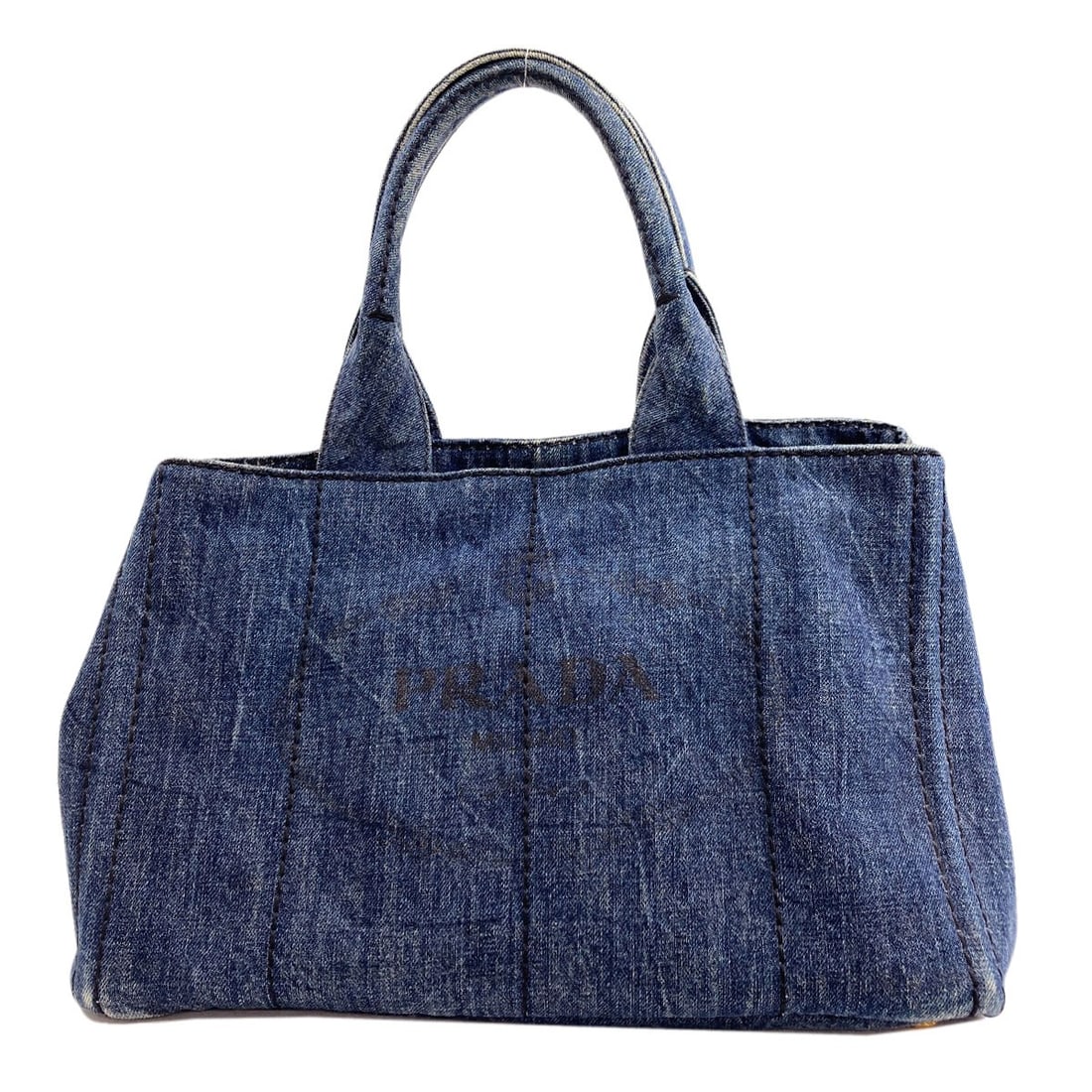 Bag Denim Canapa Tote Prada B1877B: Bag Denim Canapa Tote Prada B1877B Blue Denim Canapa Tote Bag from PRADA. This bag features a unique denim exterior and measures 8.7 inches in height and depth. The open closure and 13.8 inch width ma