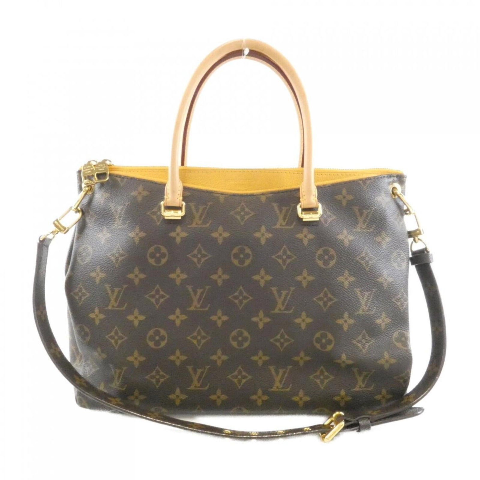 Handbag Coated Canvas Leather Louis Vuitton: Handbag Coated Canvas Leather Louis Vuitton Coated canvas and leather construction, a unique blend of materials, defines this Louis Vuitton handbag. Measuring 25cm x 34cm x 13cm, it features a brown