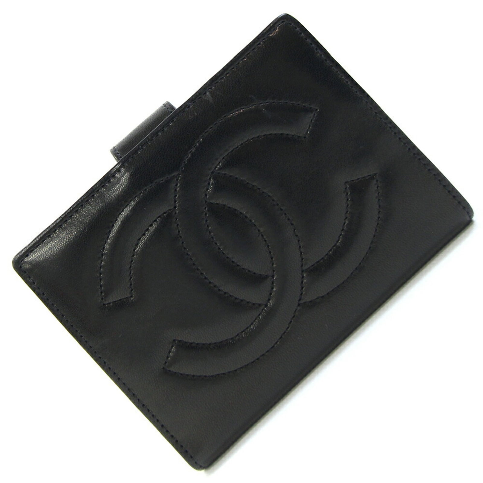 Chanel Wallet (Bi-Fold) Leather: Chanel Wallet (Bi-Fold) Leather Black Lambskin Bi-Fold Wallet from Chanel. Made from high-quality leather, this bi-fold wallet features a sleek design with clean lines and a classic style. Its compact
