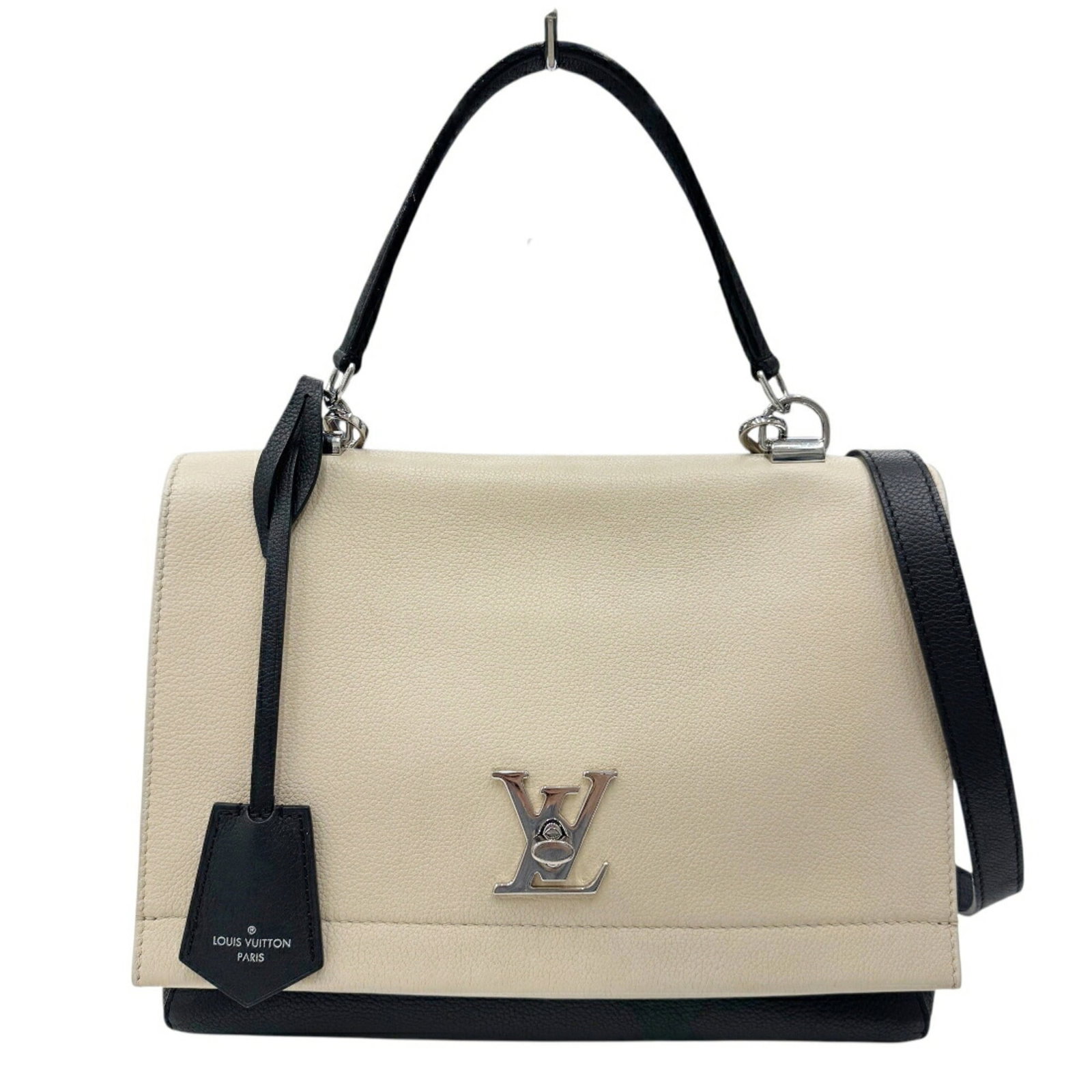 Shoulder Bag Handbag Leather Louis Vuitton: Shoulder Bag Handbag Leather Louis Vuitton The Louis Vuitton shoulder bag is crafted from high-quality calf leather in a classic beige and black color combination. Measuring 21cm x 28cm x 10cm, this