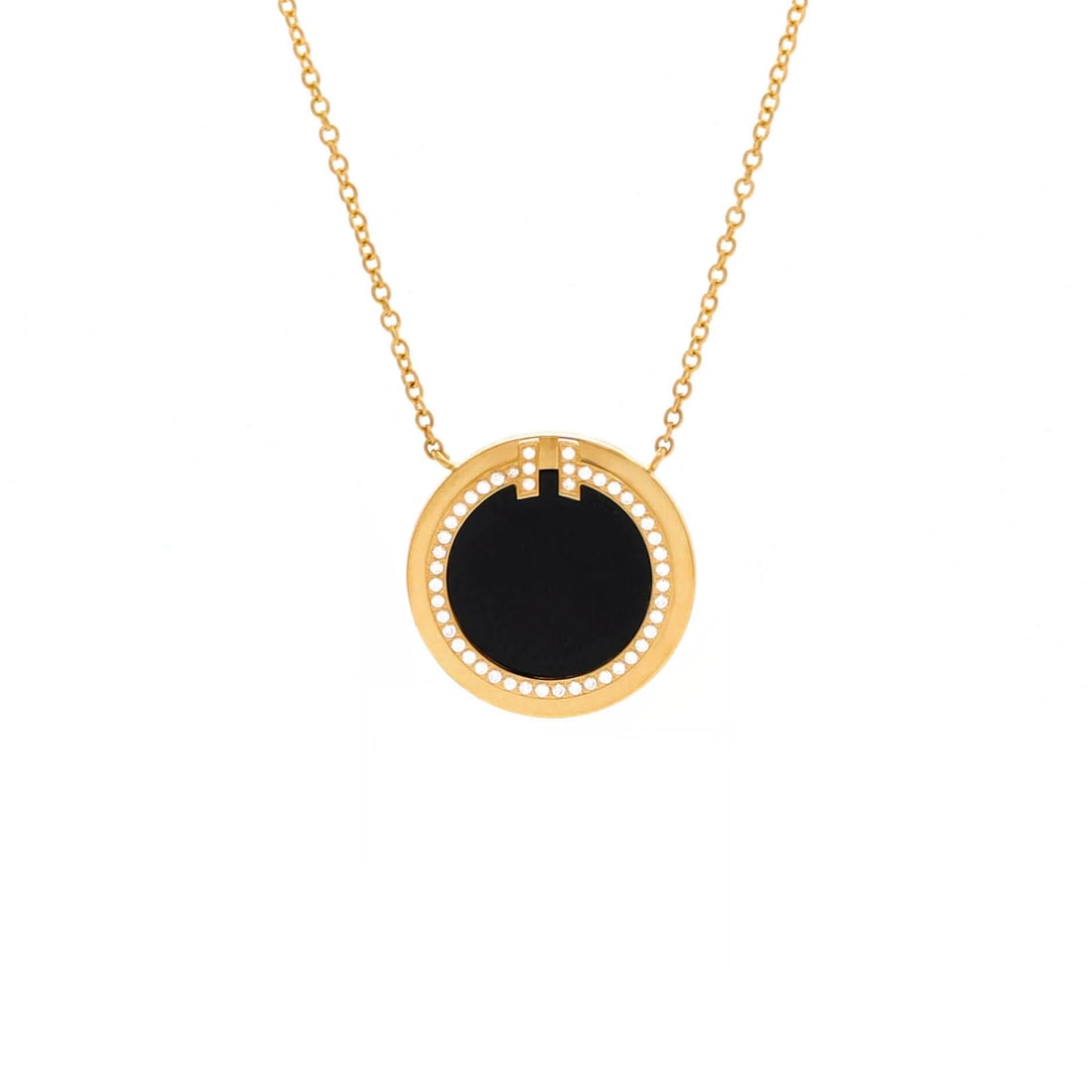 Tiffany and Co T Circle Pendant Necklace 18k Yellow Gold with Onyx Diamonds: Tiffany and Co T Circle Pendant Necklace 18k Yellow Gold with Onyx Diamonds Tiffany & Co's T Circle Pendant Necklace shines with 18k yellow gold and onyx diamonds, a classic combination of elegance