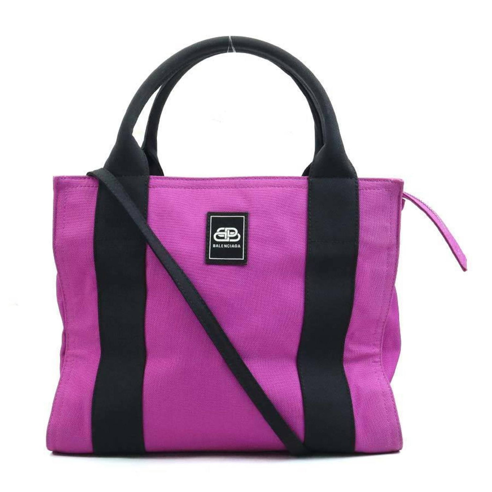 Shoulder Bag Canvas Handbag Balenciaga: Shoulder Bag Canvas Handbag Balenciaga Canvas handbag from Balenciaga, featuring a black and purple color combination, zipper closure, and interior zipper pocket. The bag measures 22cm x 28cm x 13cm