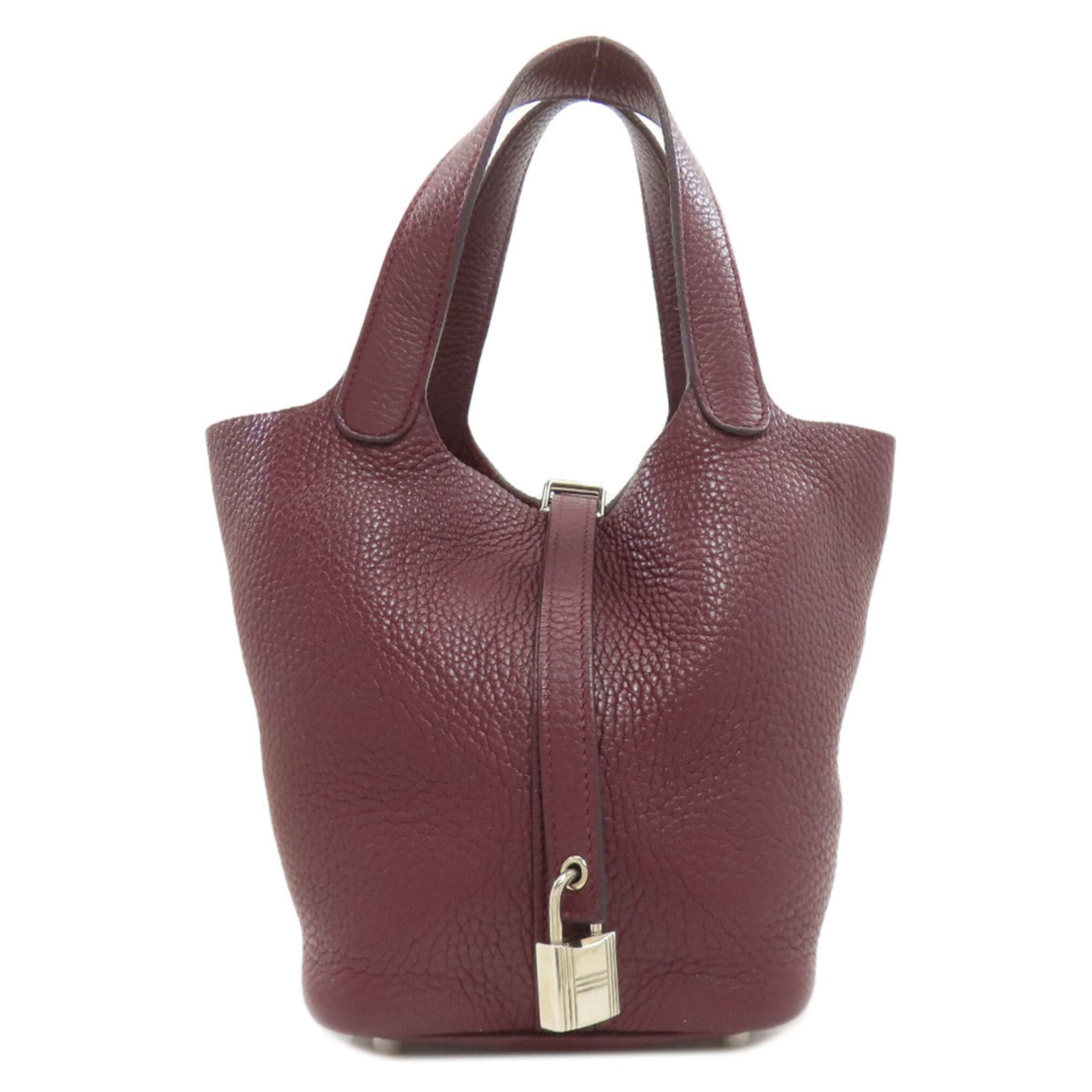 Clemence Leather Handbag Taurillon Hermes: Clemence Leather Handbag Taurillon Hermes Taurillon clemence leather gives this Picotin handbag a rich, luxurious feel. With its Bordeaux color and sleek 18cm x 14cm x 19cm dimensions, this stylish