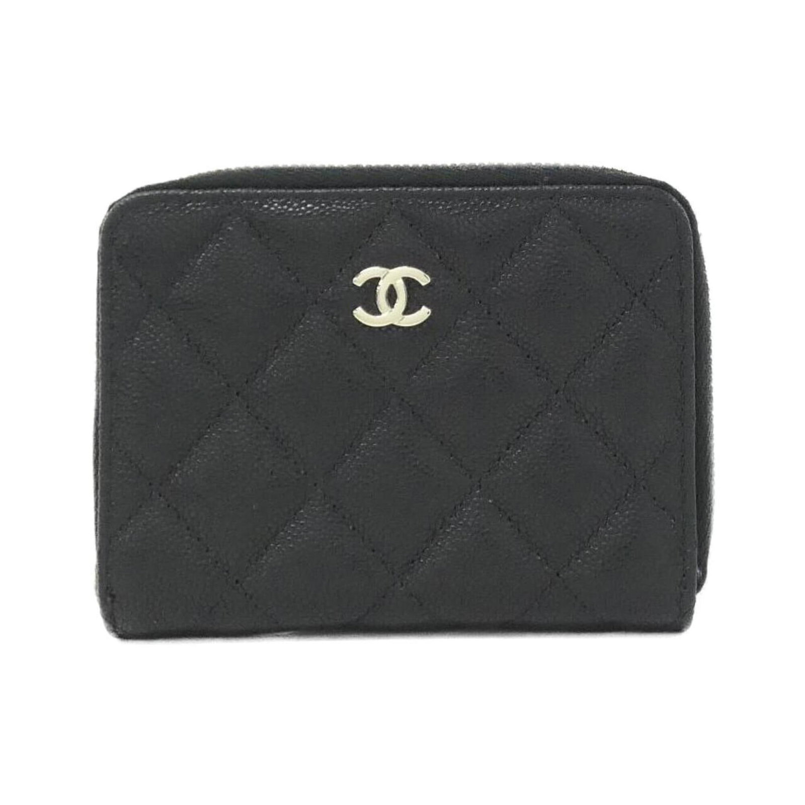 Calfskin Wallet Bi Fold Grained Chanel: Calfskin Wallet Bi Fold Grained Chanel Calfskin wallet with a classic bi-fold design, this Chanel piece features a sleek black finish and a durable, grained material that adds a touch of