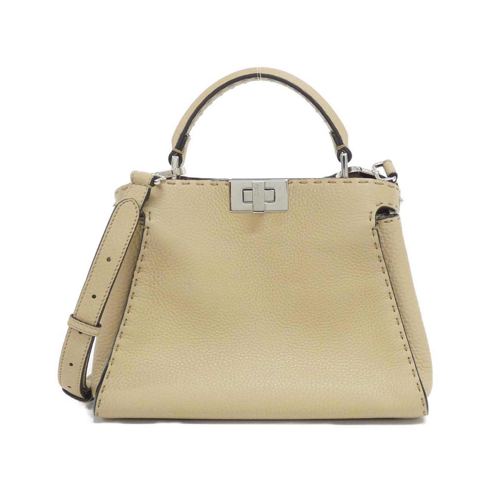 Handbag Leather Fendi: Handbag Leather Fendi Calfskin leather construction and silver hardware define this sleek Peekaboo handbag from Fendi, measuring 21cm x 27cm x 12cm. The bag's adjustable strap length and sturdy