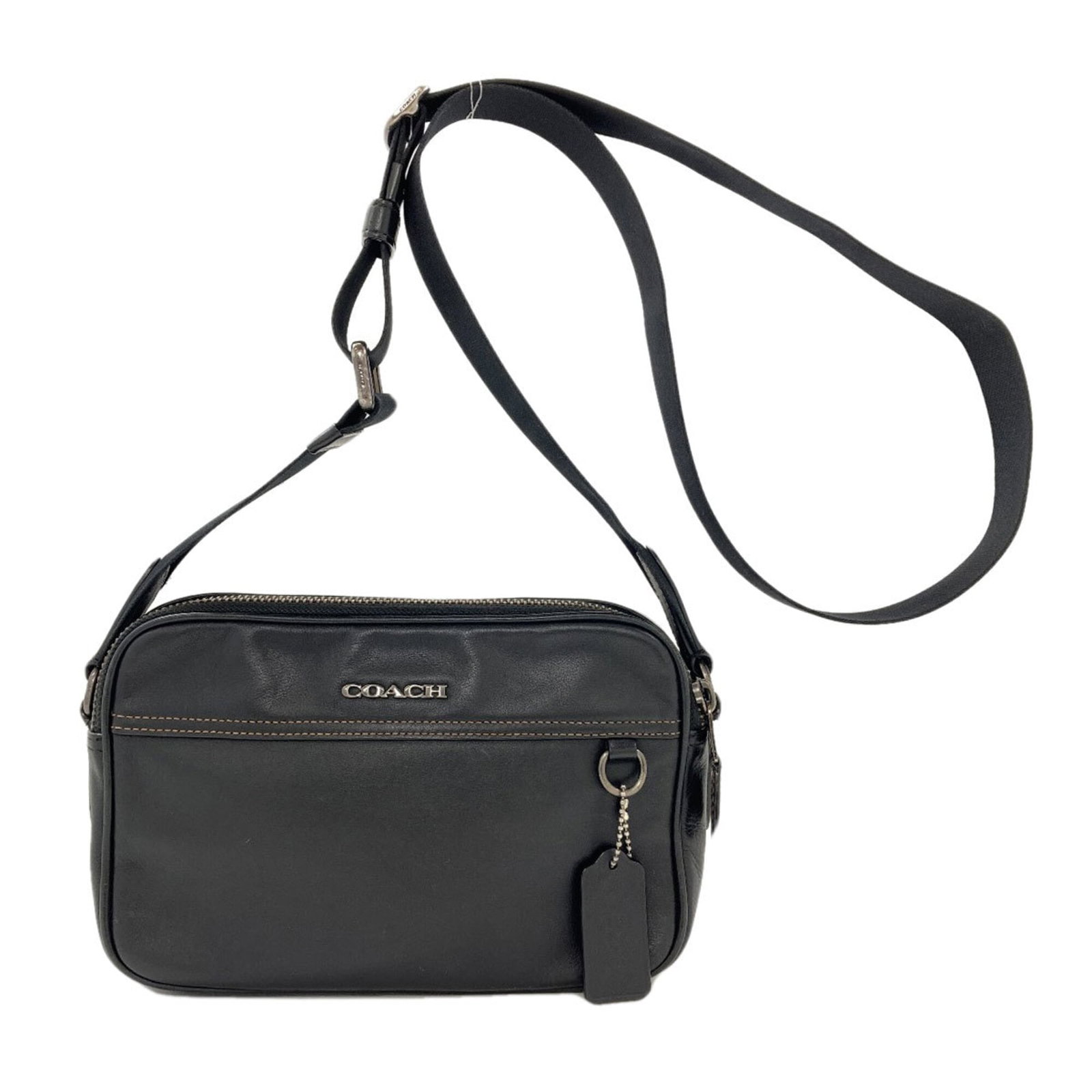Shoulder Bag Leather Coach: Shoulder Bag Leather Coach Black leather shoulder bag from Coach, featuring a zipper closure and adjustable strap length. Measuring 15cm x 23cm x 7cm, this bag is a compact and stylish accessory.