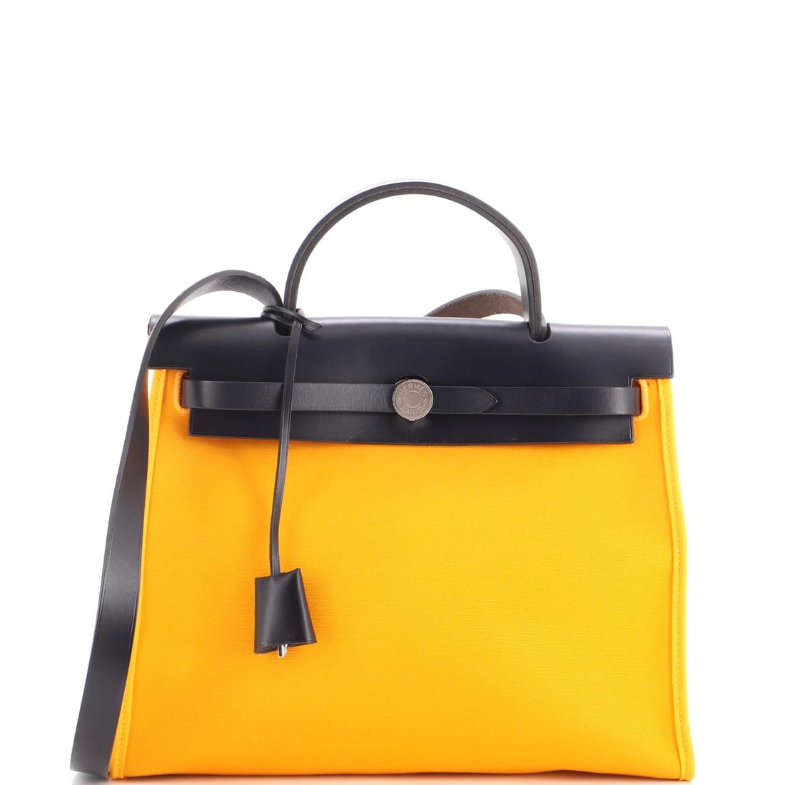 Verso Leather Hermes Toile Herbag Zip 31: Verso Leather Hermes Toile Herbag Zip 31 The Verso Leather Hermes Toile Herbag Zip 31 is a stylish shoulder bag with a classic design, featuring a vibrant yellow exterior and a blue interior. This ico