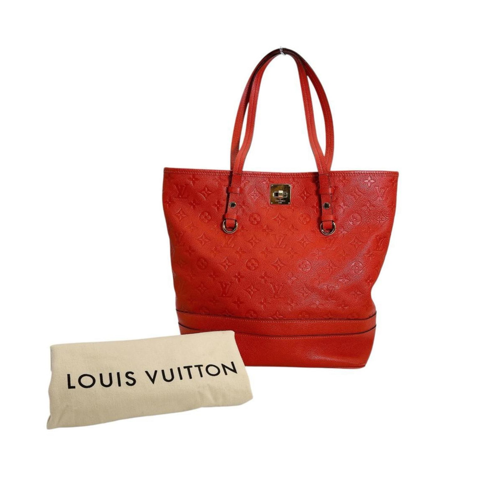 Monogram Empreinte Louis Vuitton Tote: Monogram Empreinte Louis Vuitton Tote Auriane Monogram Empreinte Louis Vuitton Tote features the iconic brand's signature style with a timeless design. This luxurious tote bag boasts a classic 32cm x