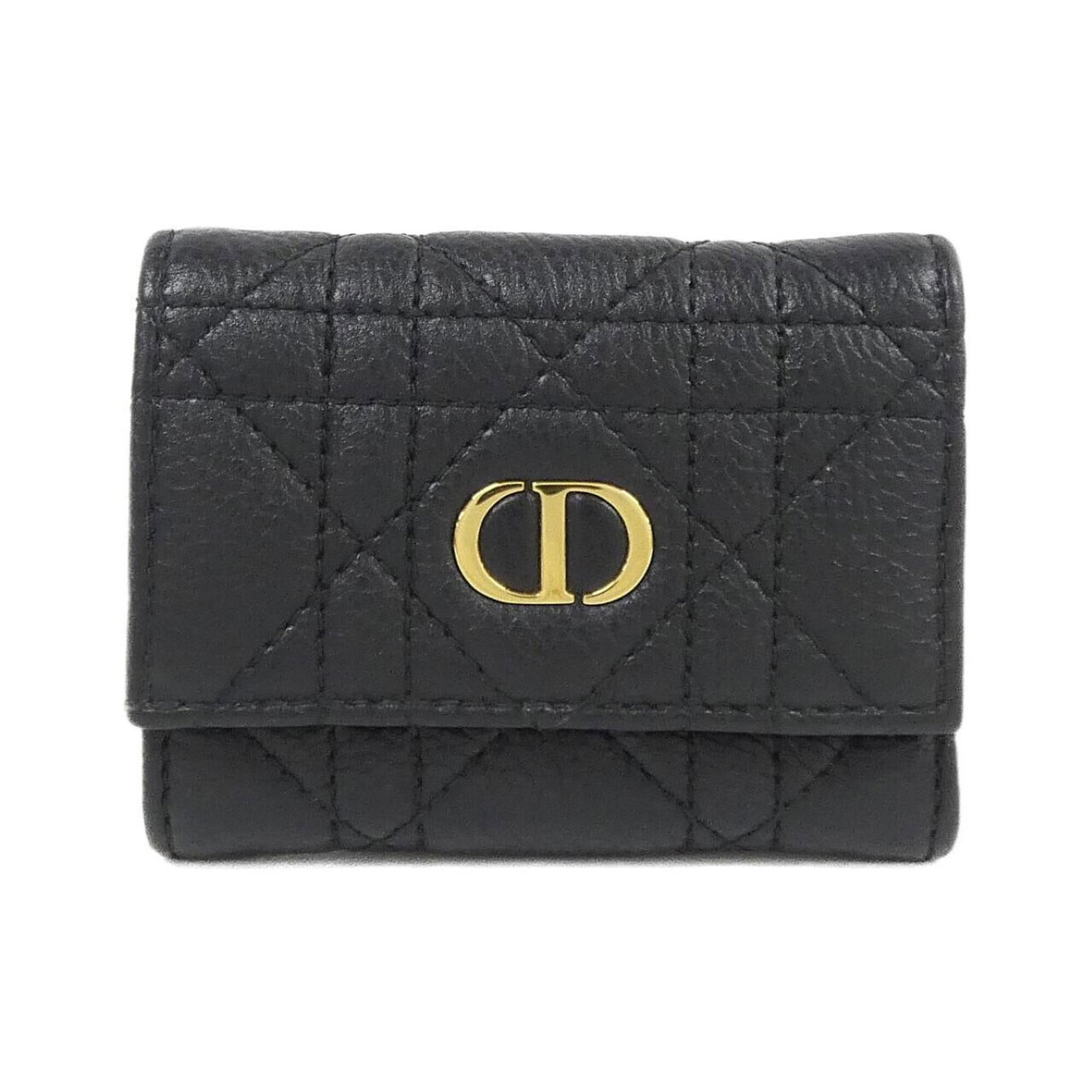 Christian Dior Wallet (Tri-Fold) Leather: Christian Dior Wallet (Tri-Fold) Leather Christian Dior's tri-fold leather wallet is a sleek and sophisticated accessory, crafted from high-quality calfskin leather in a classic black finish. Its comp