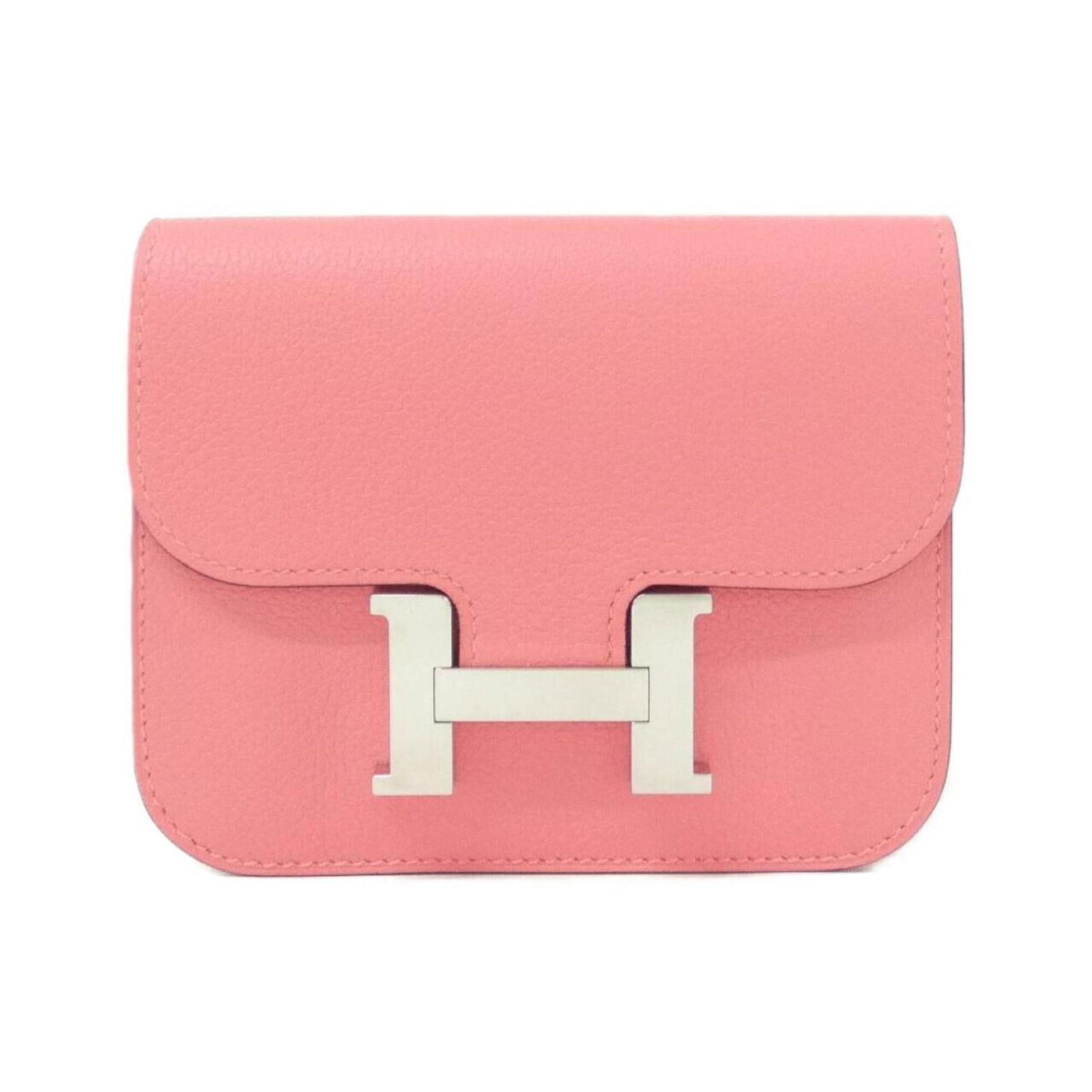 Coin Purse Coin Case: Coin Purse Coin Case Pink coin purse/coin case with a size of 10cm x 12cm x 2cm, designed by Hermes. This compact case is made of a sturdy material and features a vibrant pink color. Its compact size