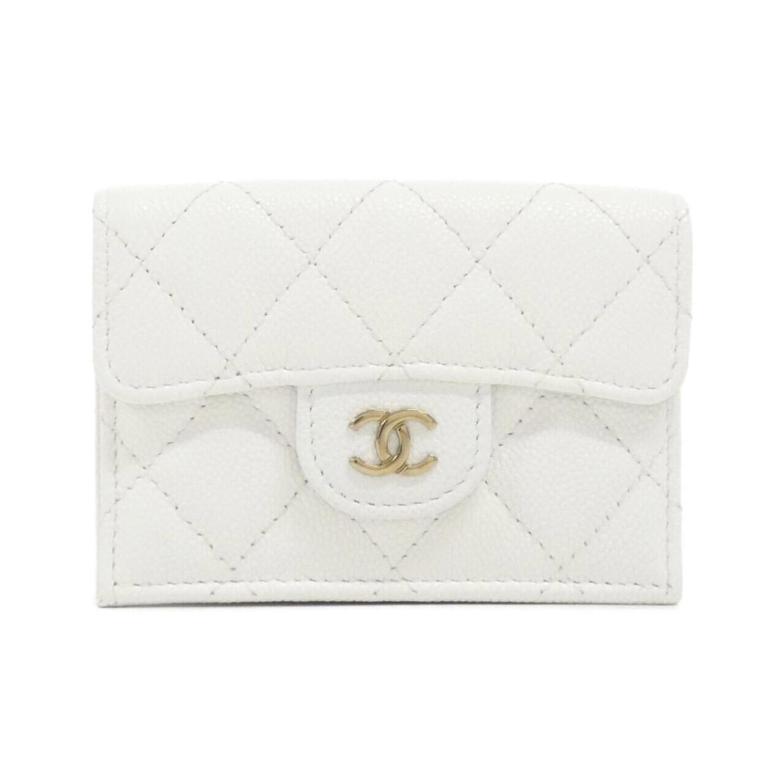 Chanel Wallet (Tri-Fold) Grained Calfskin: Chanel Wallet (Tri-Fold) Grained Calfskin Tri-fold wallet in white grained calfskin, a classic design from Chanel. Made from high-quality materials, this wallet features a timeless design that will