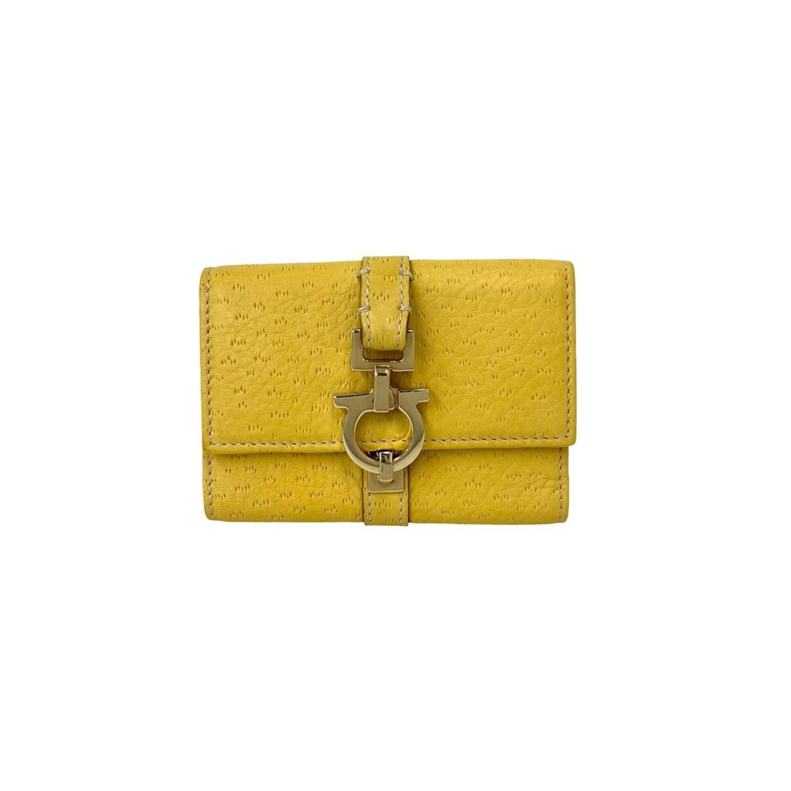 Ferragamo Leather Keycase Salvatore: Ferragamo Leather Keycase Salvatore Yellow leather keycase from Salvatore Ferragamo, bearing a signature, measures 7cm x 10cm x 2.75'' x 3.93''. Made from high-quality leather, this compact keycase