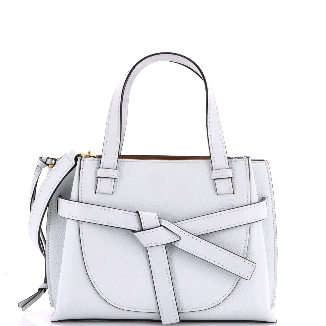 Leather Mini Tote Gate Loewe: Leather Mini Tote Gate Loewe The iconic Gate Tote from Loewe's leather collection features a sleek, blue exterior and a spacious interior with suede lining. This mini tote boasts a classic top handle
