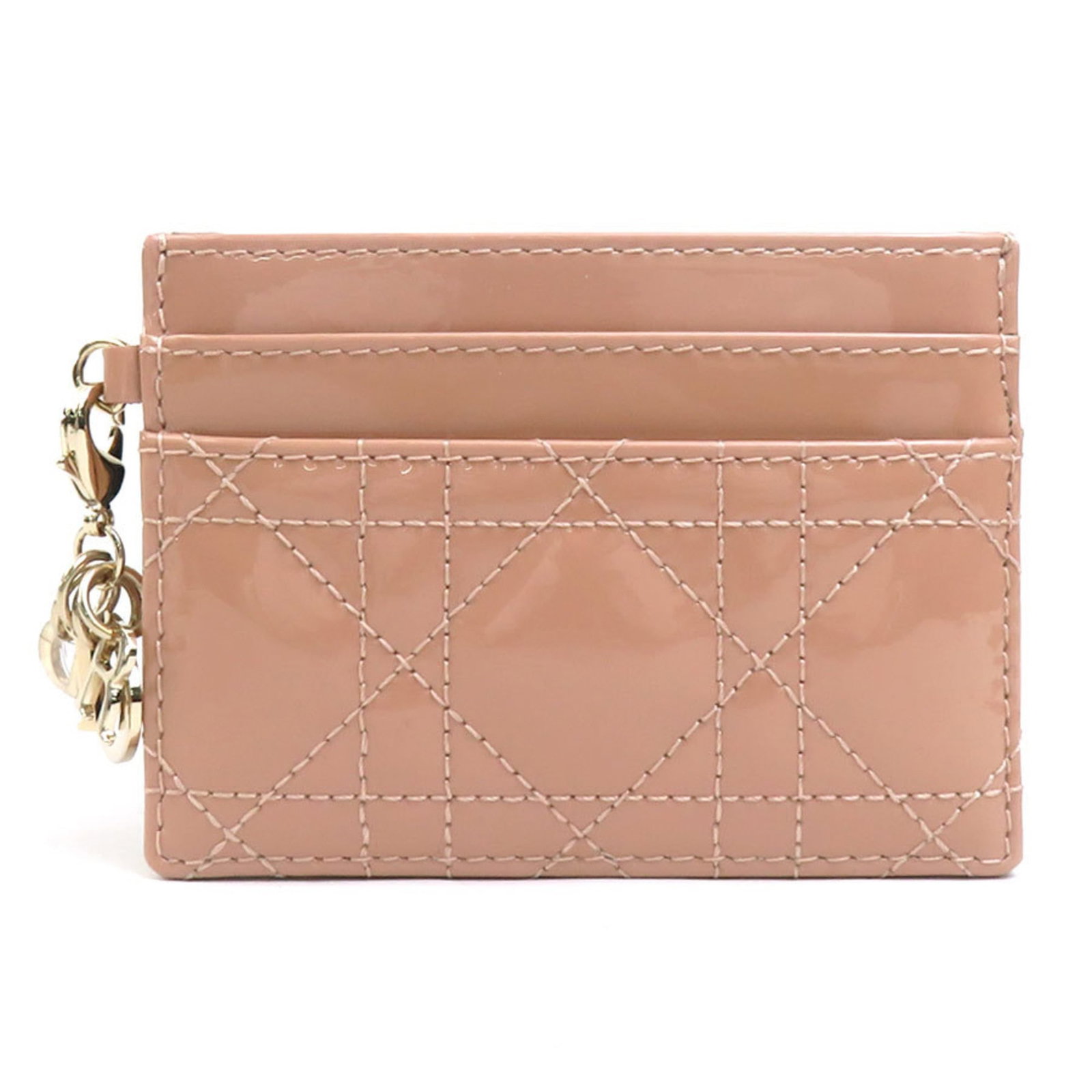 Leather Christian Dior Business Card Case: Leather Christian Dior Business Card Case This pink beige leather business card case is crafted from high-quality leather, featuring a classic design that exudes sophistication. Made in Italy, the