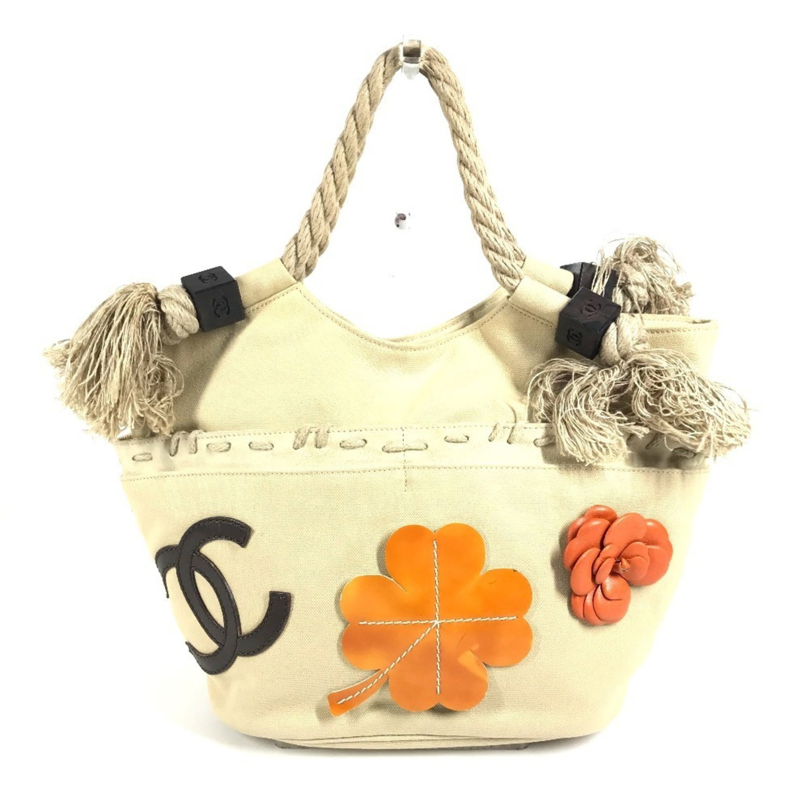 Canvas Shoulder Bag Chanel Handbag: Canvas Shoulder Bag Chanel Handbag Canvas Shoulder Bag in Beige, a classic Chanel design. This 23.5cm x 24cm x 13cm shoulder bag features canvas material and a timeless beige color. Item Specifics: