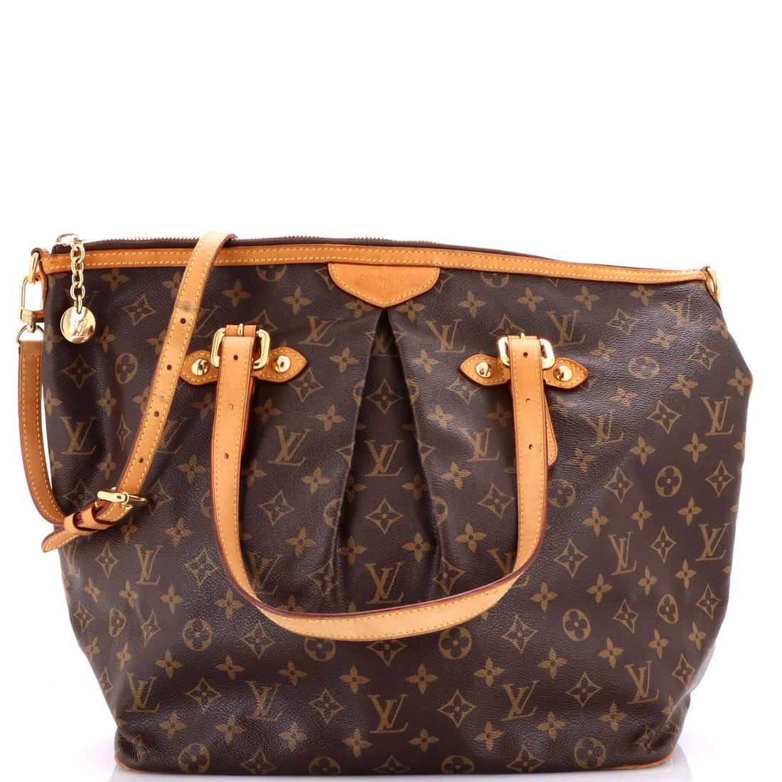 Louis Vuitton Palermo Handbag Monogram Canvas GM: Louis Vuitton Palermo Handbag Monogram Canvas GM The Louis Vuitton Palermo Handbag Monogram Canvas GM is a classic tote with a rich, brown canvas exterior and gold hardware. Measuring 14" tall and