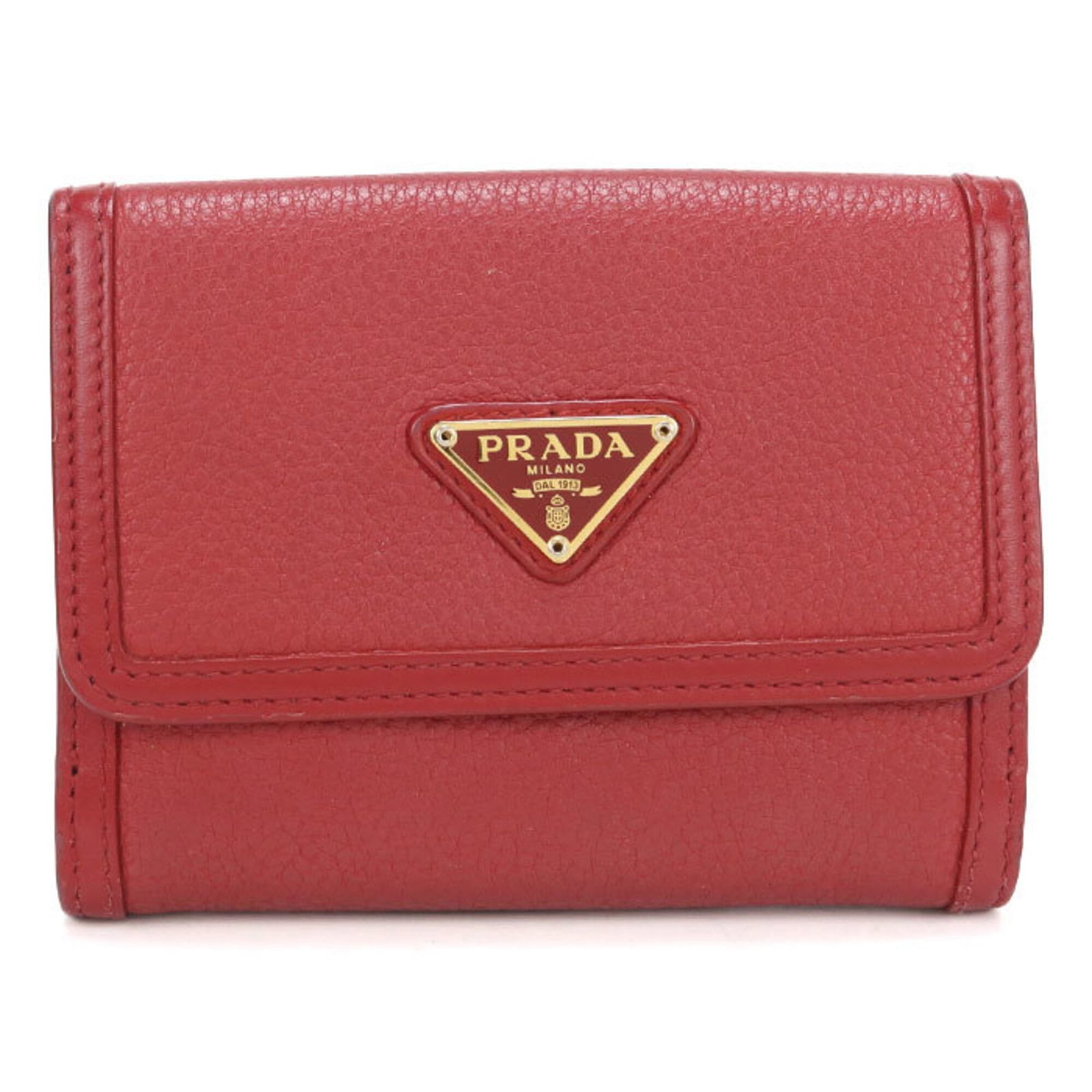 Bi fold leather wallet: Bi fold leather wallet Made from high-quality calfskin leather, this bi-fold wallet boasts a striking red color. Its sleek design and compact size make it a stylish accessory for everyday use. With