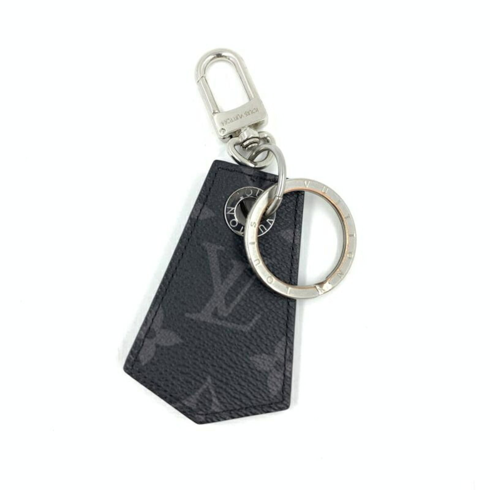 Monogram Eclipse Keyring Louis Vuitton: Monogram Eclipse Keyring Louis Vuitton Monogram Eclipse Keyring Louis Vuitton. Made from Monogram Eclipse material, this keyring features a distinctive design. With its 8cm x 5.2cm dimensions, it is