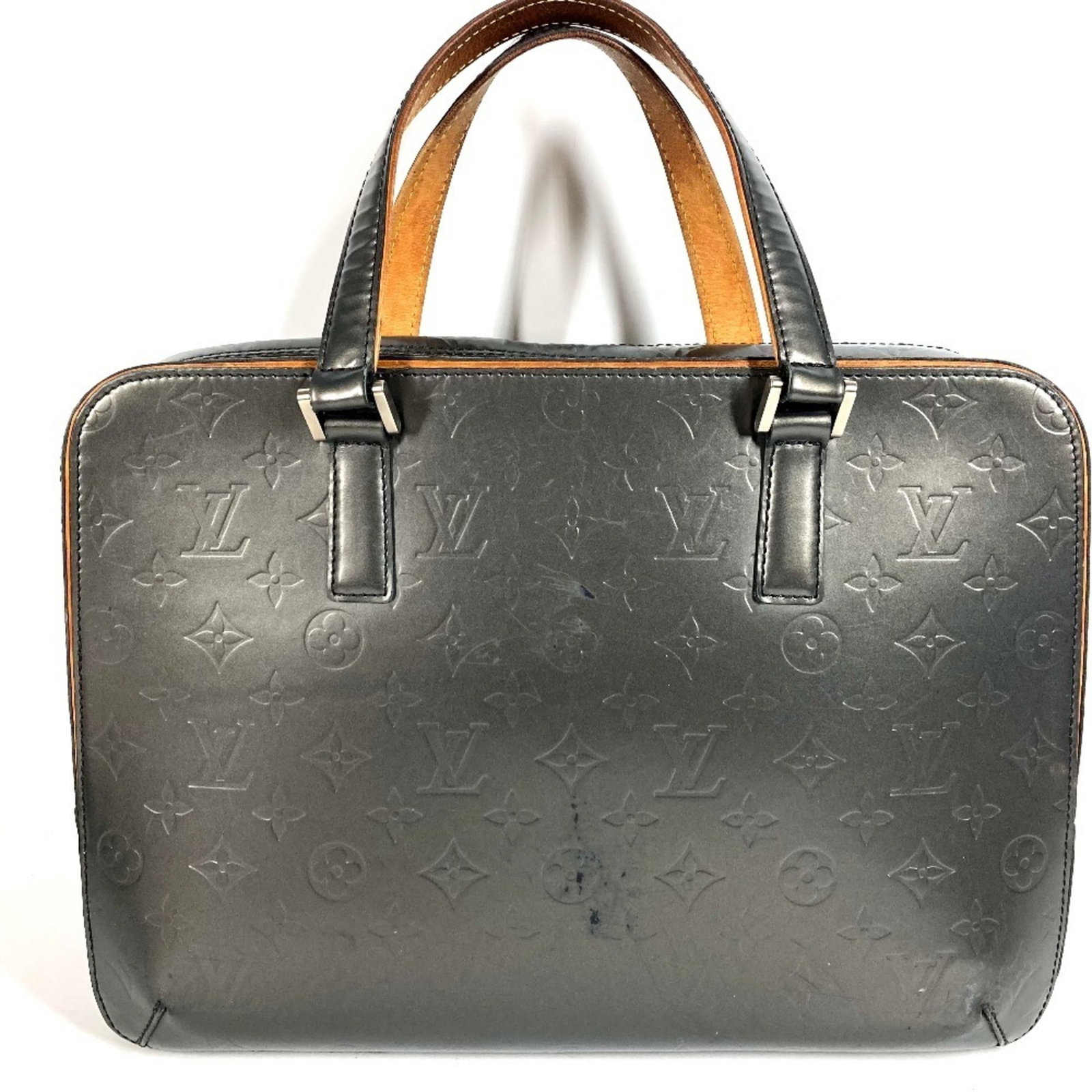 Tote Bag Leather Mat Monogram Louis Vuitton Briefcase: Tote Bag Leather Mat Monogram Louis Vuitton Briefcase Monogram Mat leather provides a unique and stylish touch to this Louis Vuitton briefcase. The classic navy color and iconic design make it a
