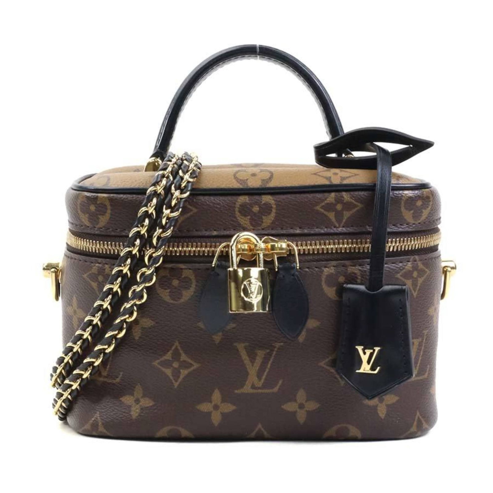 Vanity Monogram Louis Vuitton Reverse Shoulder Bag: Vanity Monogram Louis Vuitton Reverse Shoulder Bag The Louis Vuitton Reverse Shoulder Bag is a stylish and functional vanity bag with a distinctive monogram reverse design. This brown bag features a c