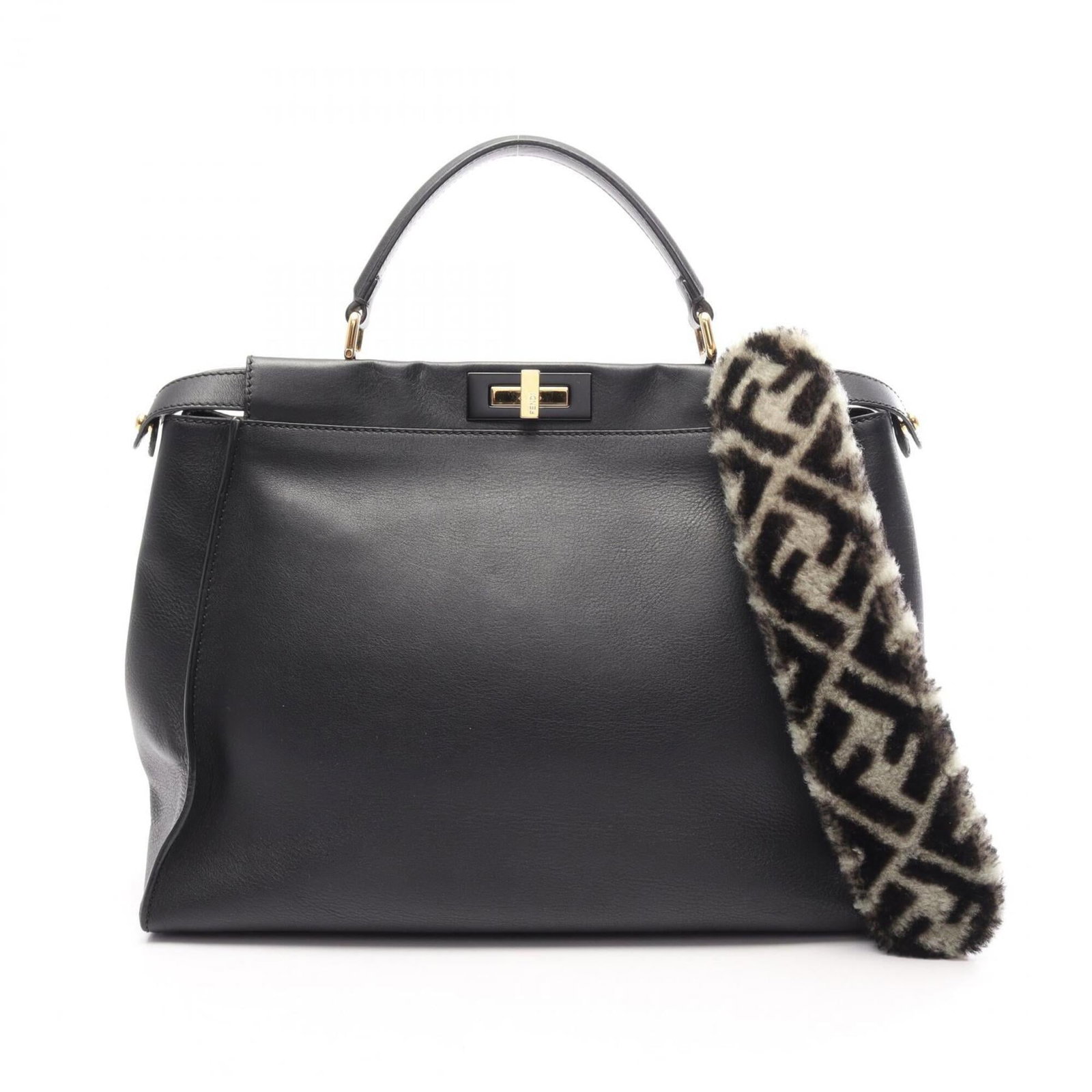 Handbag Leather Fendi: Handbag Leather Fendi Black Fendi handbag made from leather, measuring 29cm x 40cm x 16cm. The bag features a sleek design with a signature that bears a mark. A stylish accessory for everyday use.